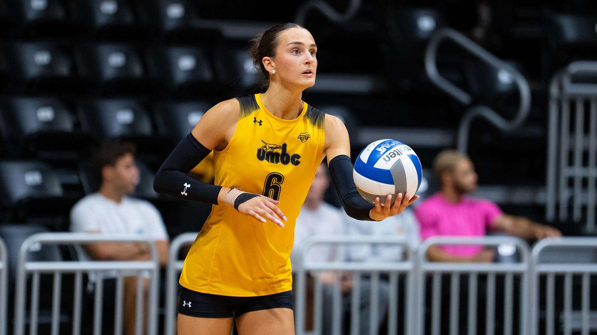Hannah Dobbs serves against George Mason