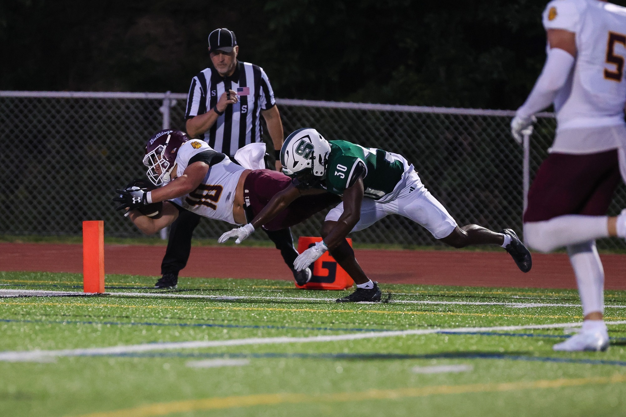Alex Riley dives into the endzone.