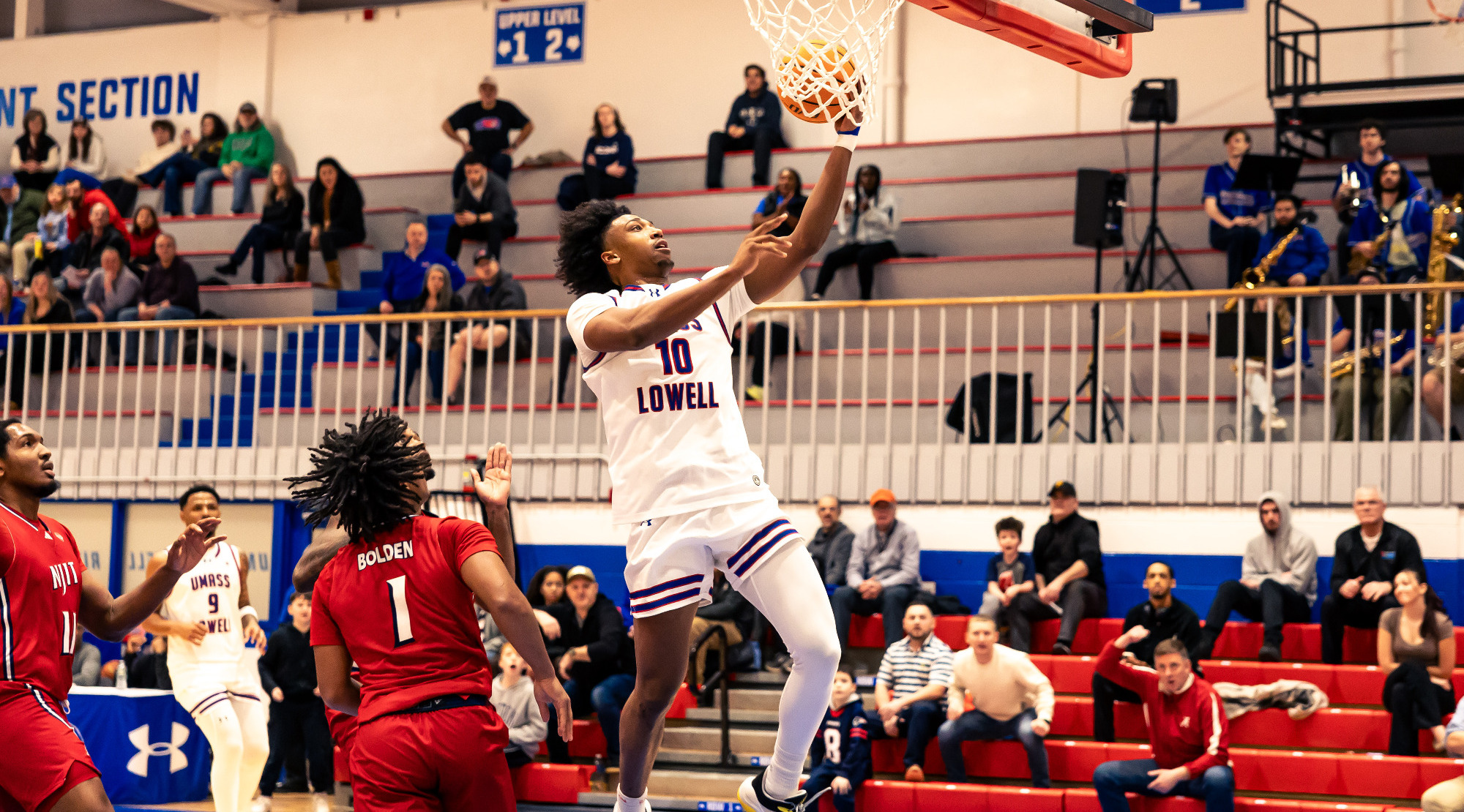 Austin Green jumping for a one-handed layup