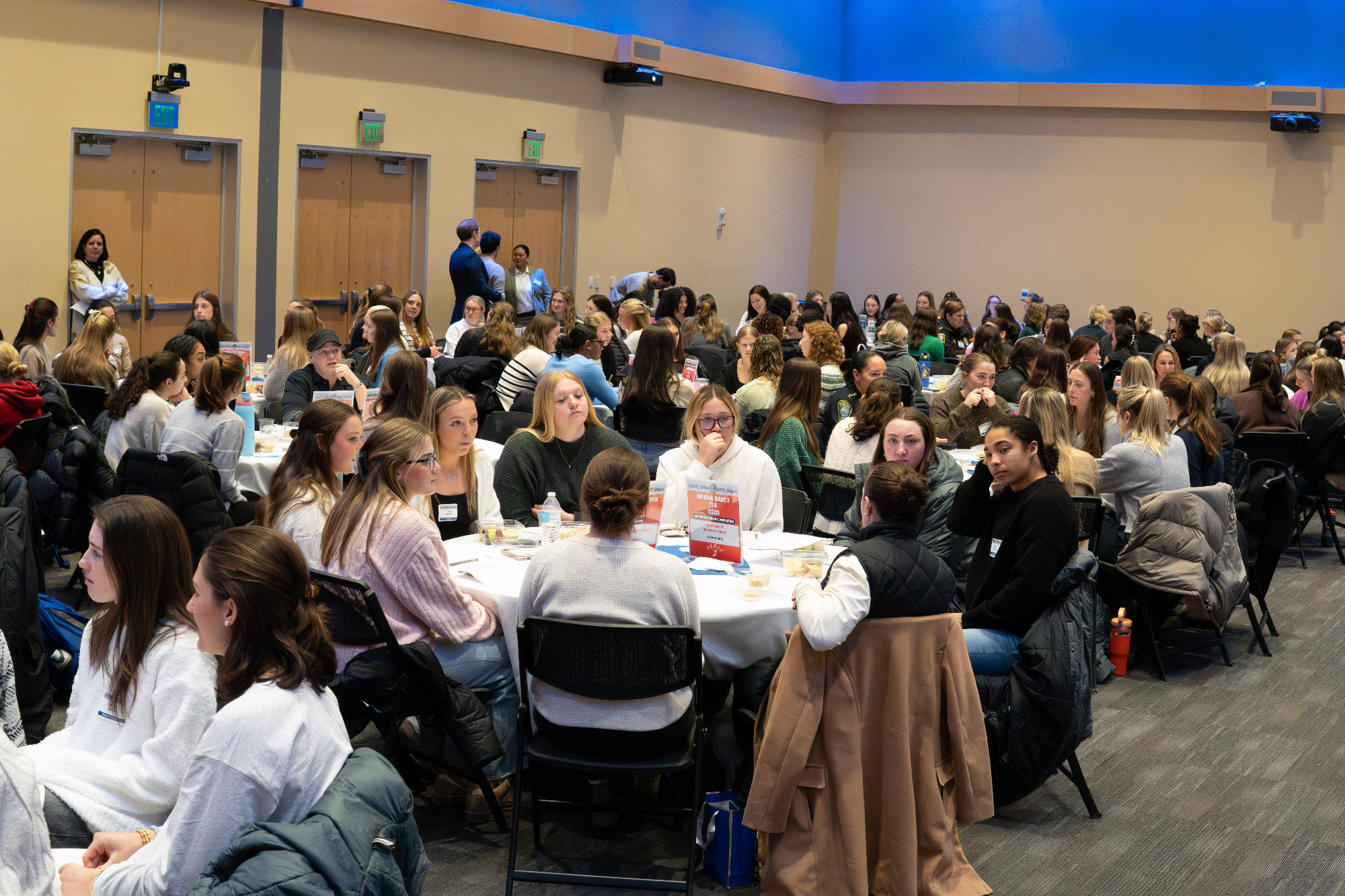 Women talking at round tables at Networking event