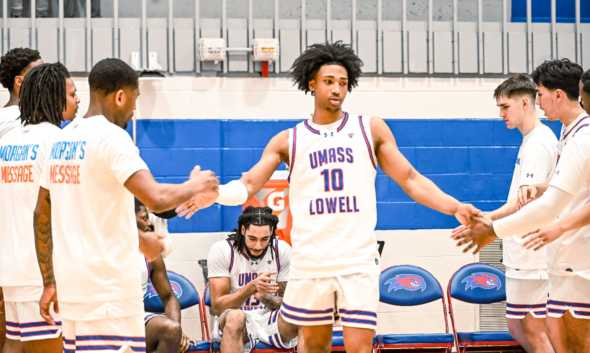 Austin Green giving high-fives during introductions