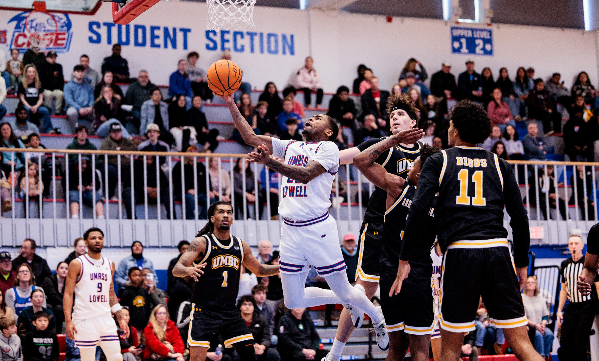 Khalil Farmer jumping for a layup against UMBC