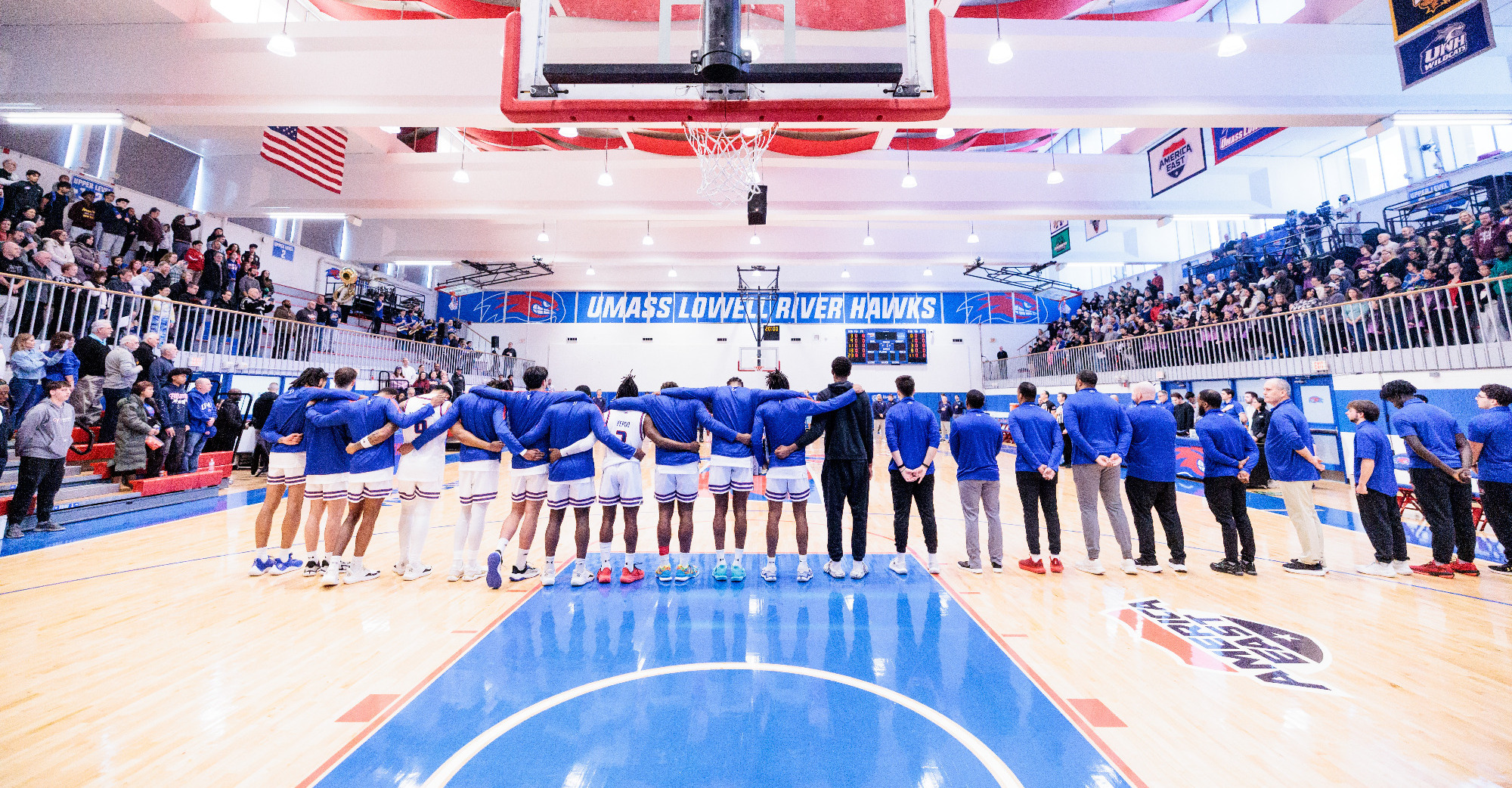 Men's Basketball Team lined up for national anthem