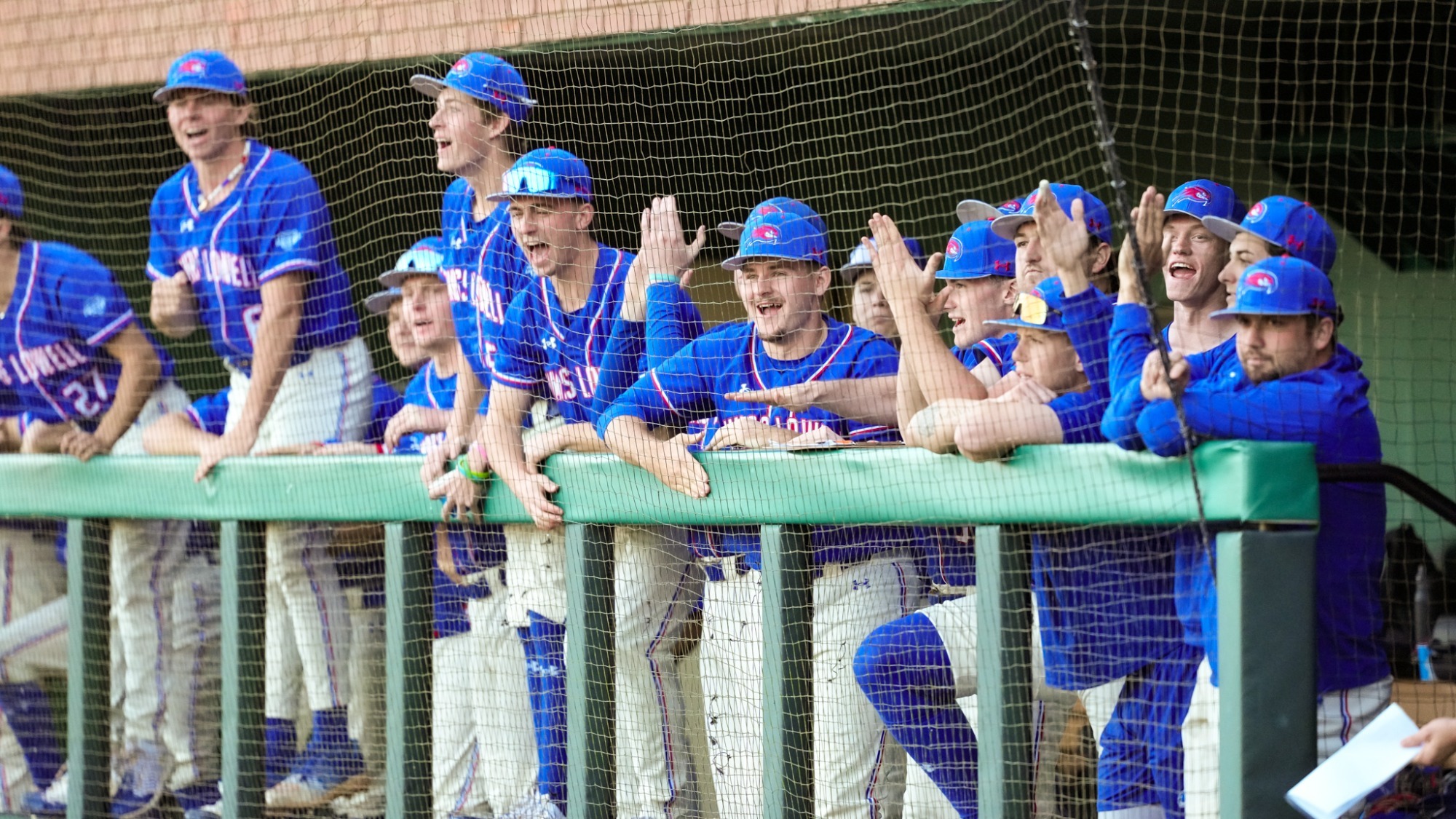 UML Baseball - 3/6 - Dugout celebration - at San Francisco