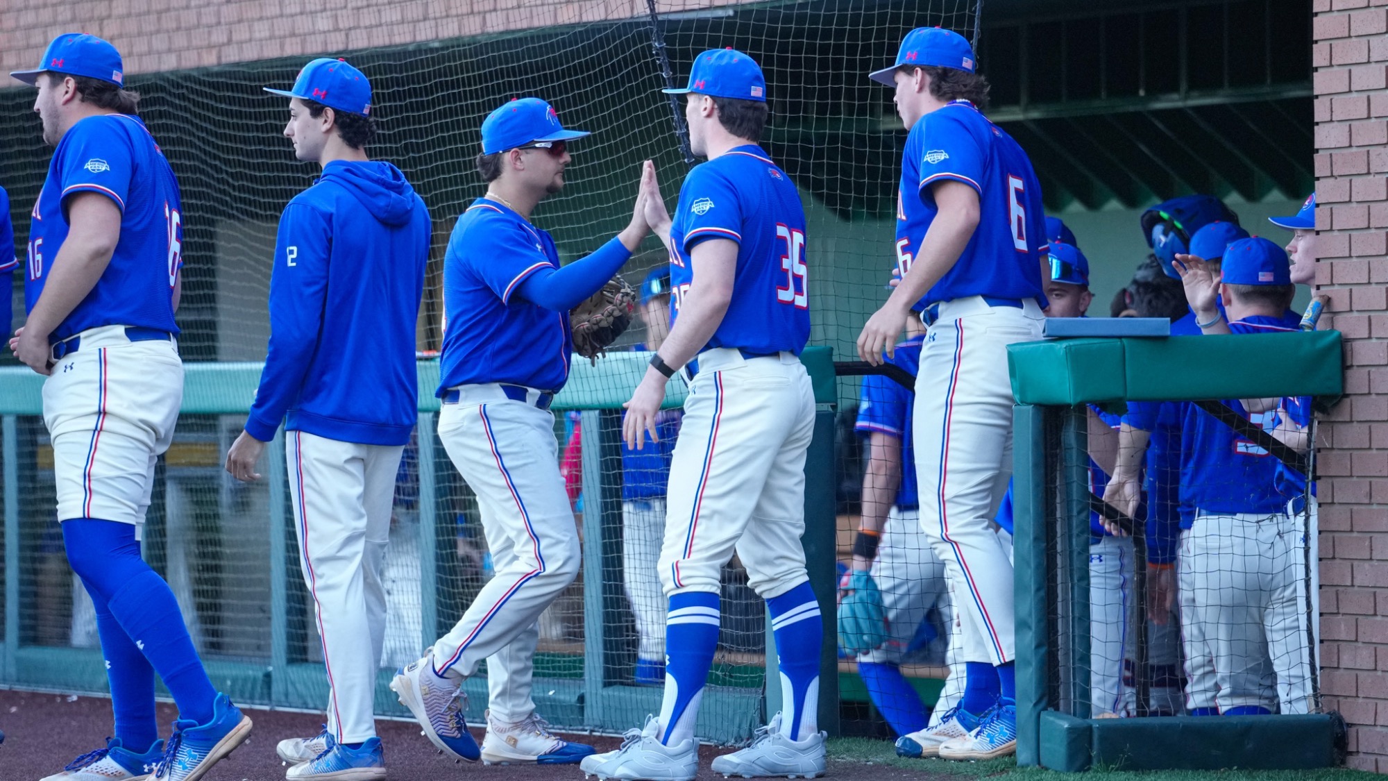 UML Baseball - team celebration - 3/6 at San Francisco