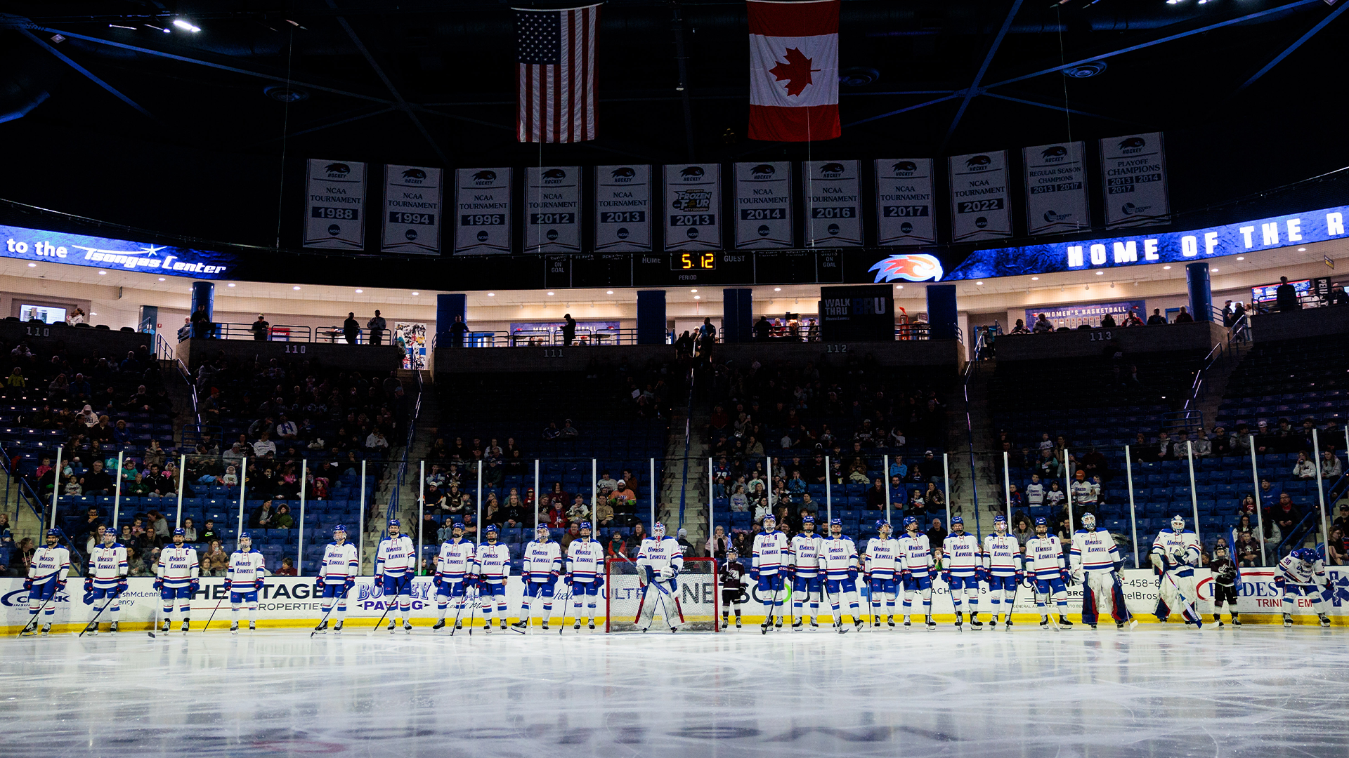 Hockey Season Recap Photo 2025-26, showing the team lined up before national anthem