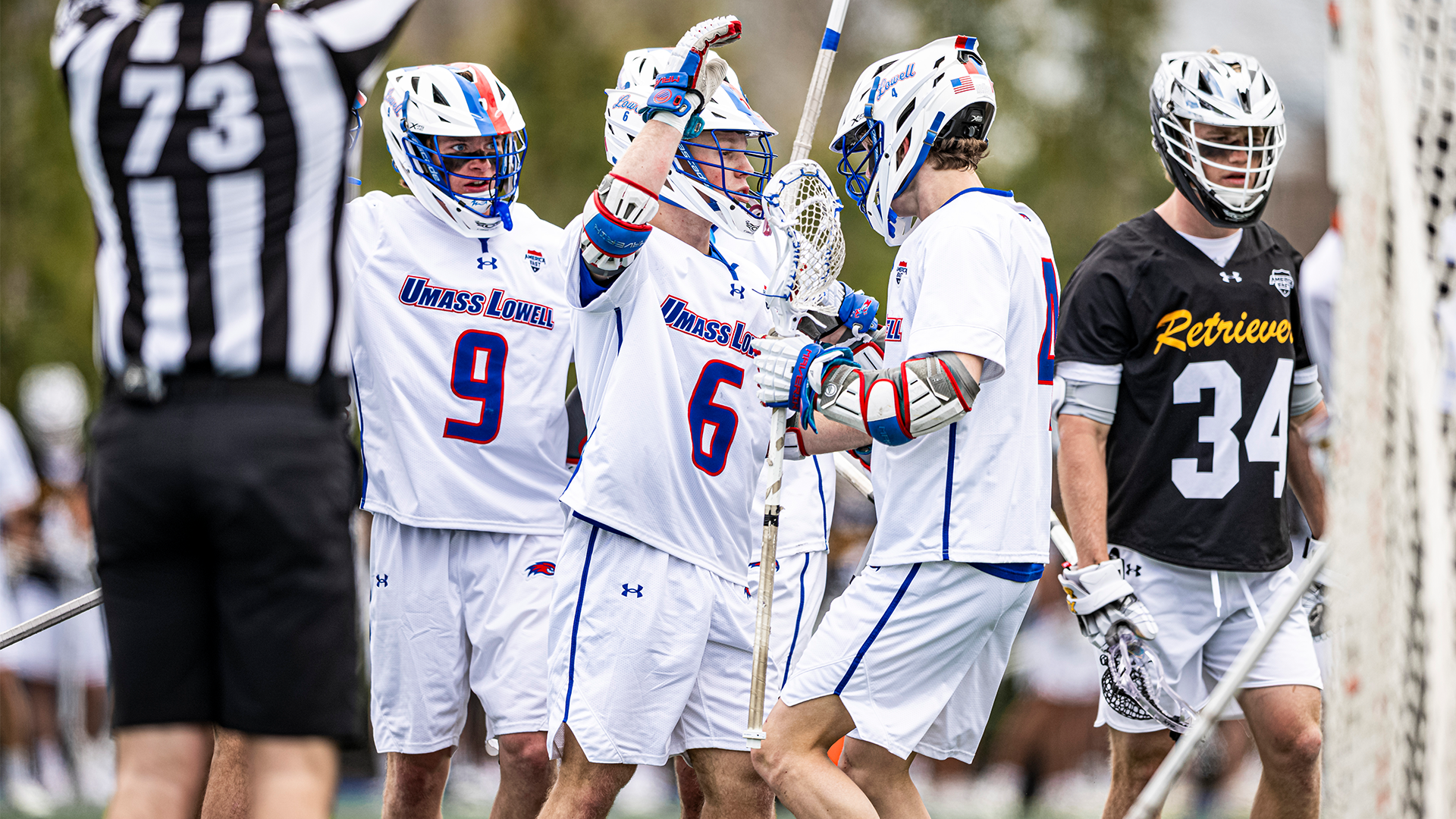 Griffin Sumwalt and Danny Burke celebrate after gaol against UMBC