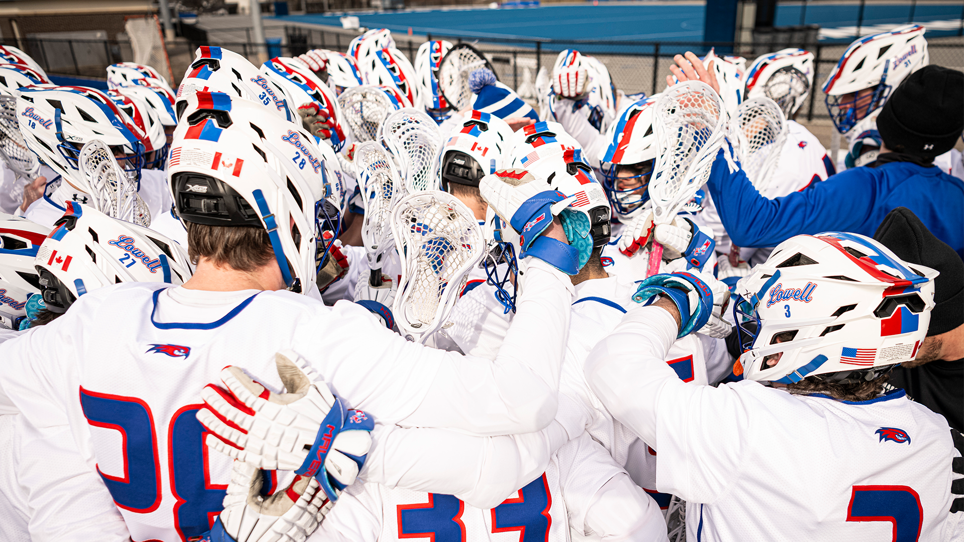 Men's lacrosse huddled up before game against UAlbany