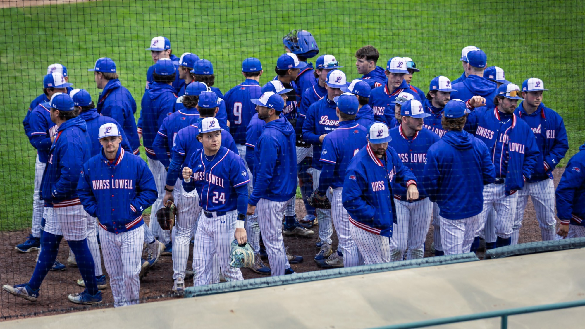 The UMass Lowell baseball team breaking the pre-game huddle after the Head Coach talked with the team 