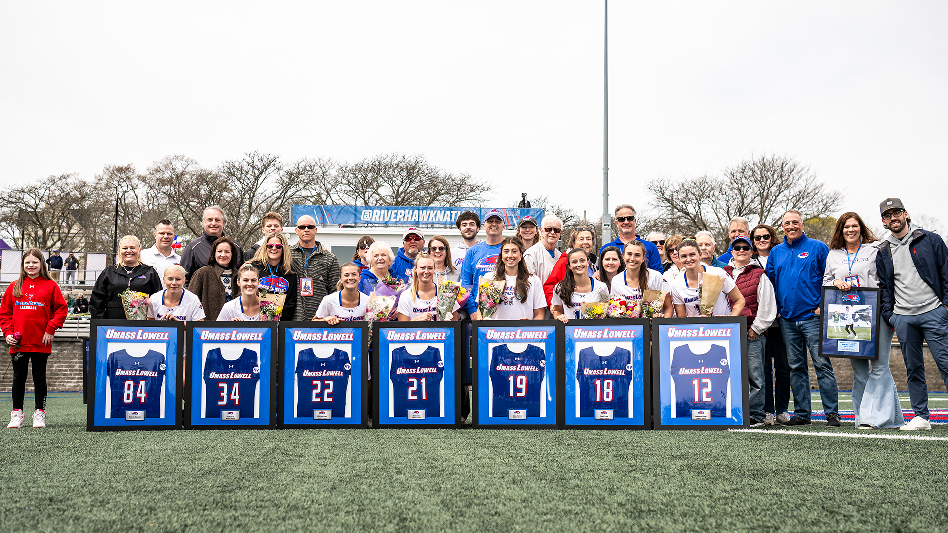 Women's Lacrosse Class of 2026 Senior Day Photo with Families