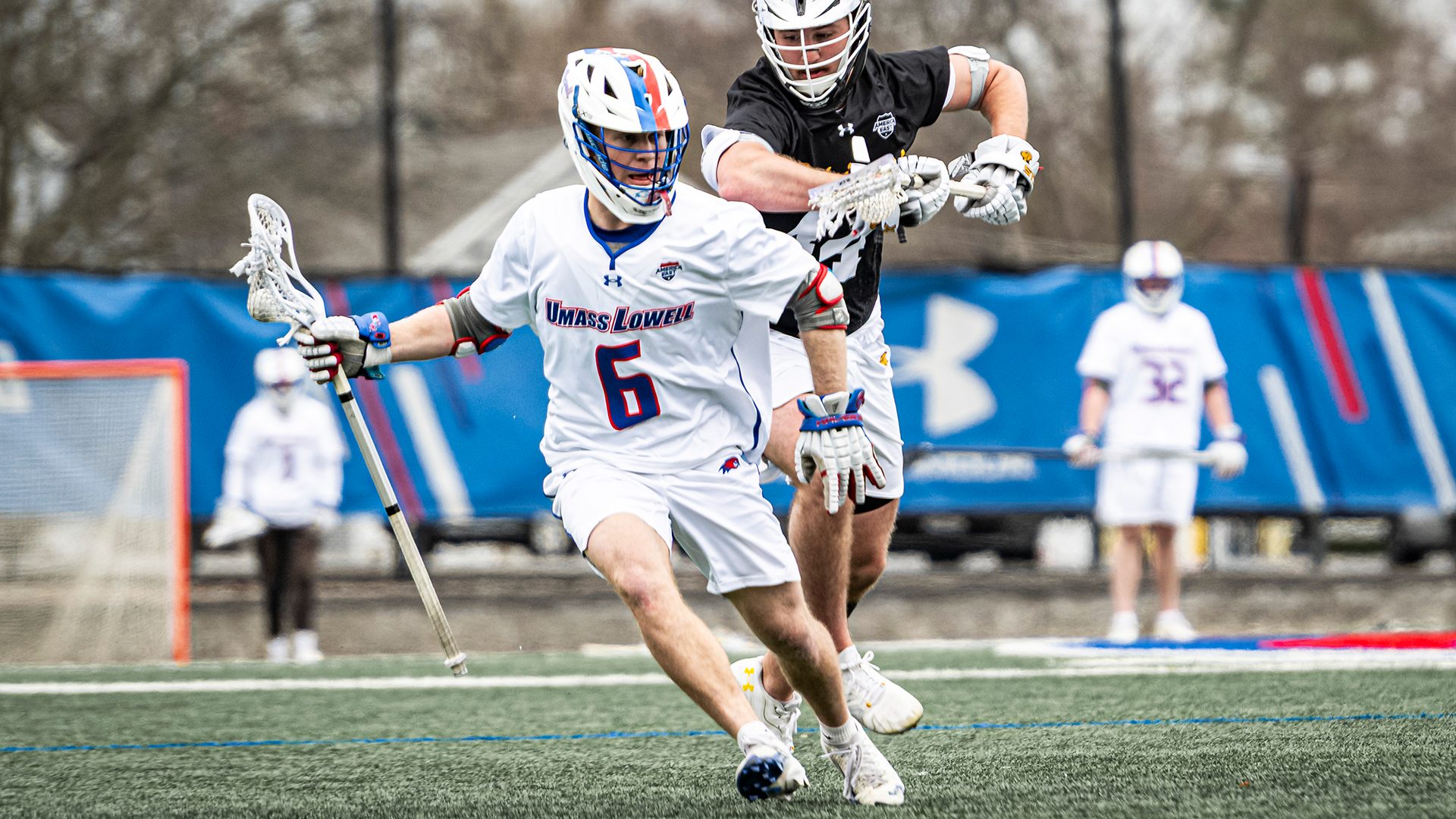 Griffin Sumwalt with the ball in stick vs. UMBC