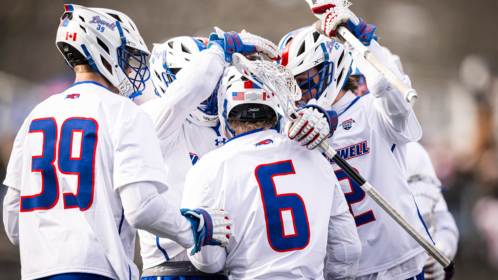 Men's lacrosse group celebration after goal vs. UMBC