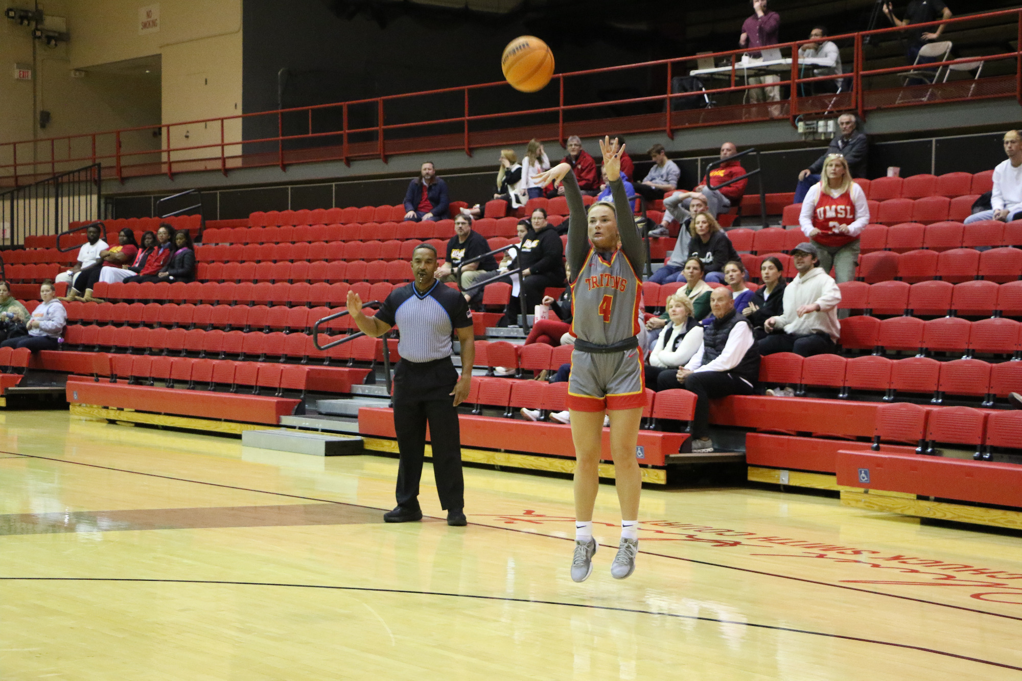 Kate Rolfes shoots a 3-point shot