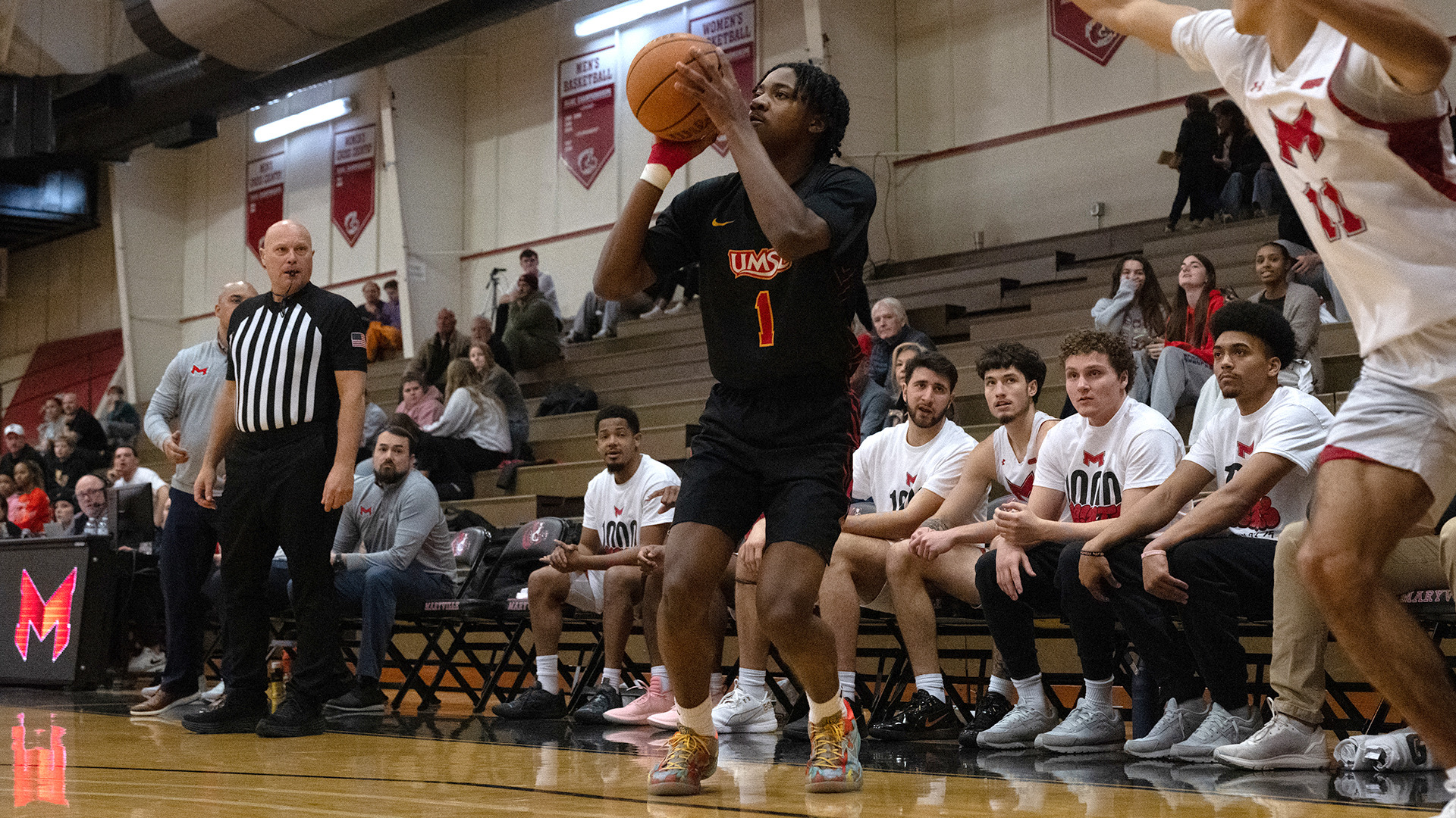 Quenton Parker goes up for a three-point shot attempt