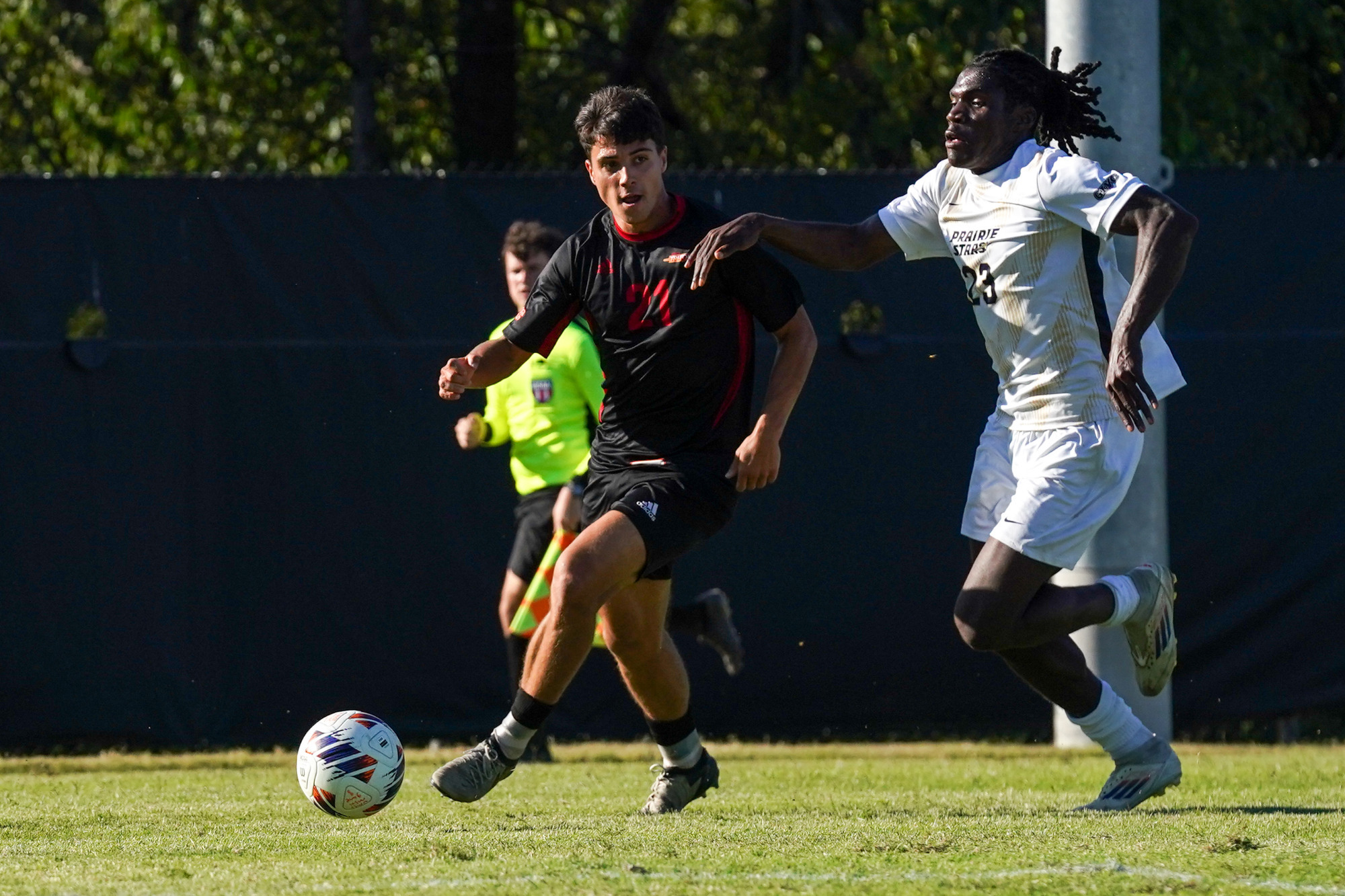 Pablo Nodar dribbles past an Illinois Springfield defender