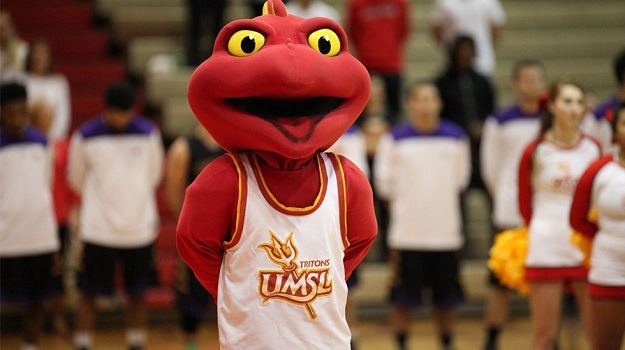 Louie cheering at a home game