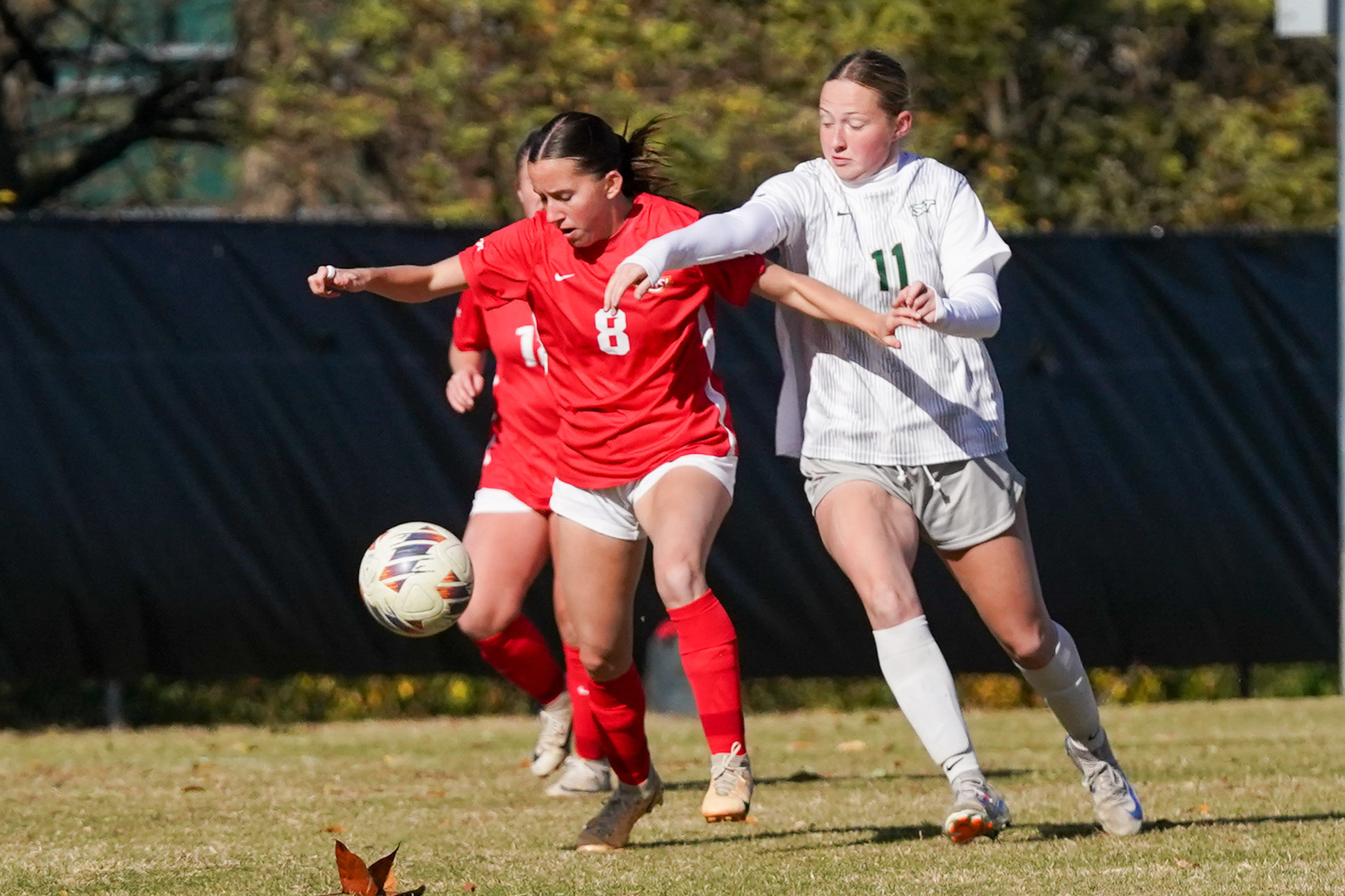 Rachel Skyberg battles a Missouri S&T player for position of the ball
