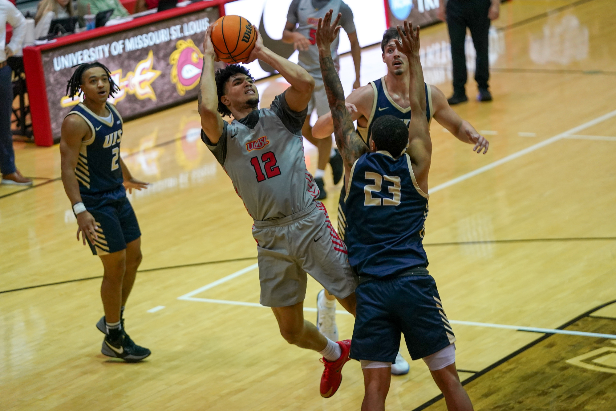 Vincent Davis III attempts a jump shot against Illinois Springfield