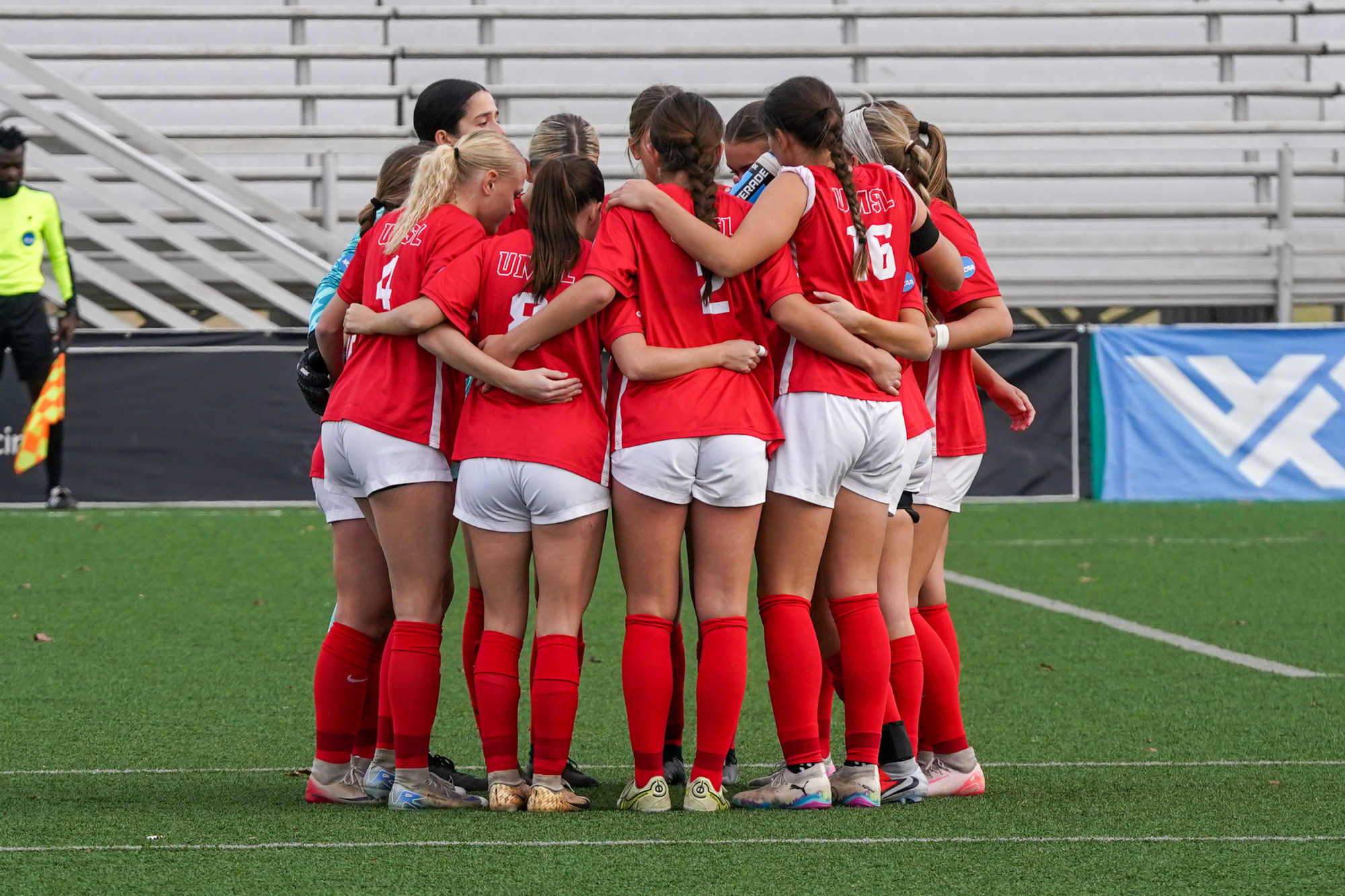Women's Soccer huddles before its NCAA Quarterfinal contest against Washburn