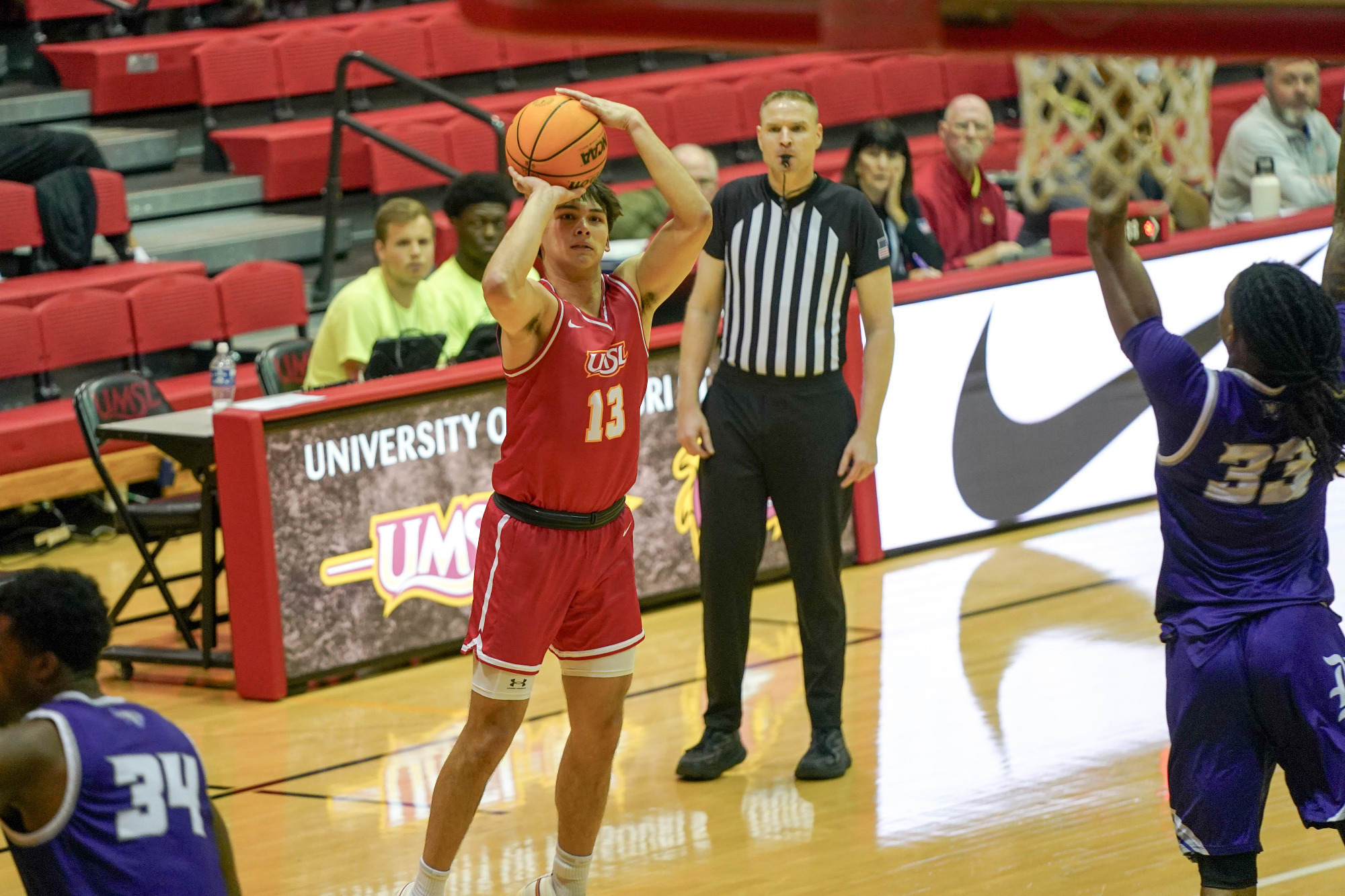 Miles Boland attempts a jump shot against Kentucky Wesleyan