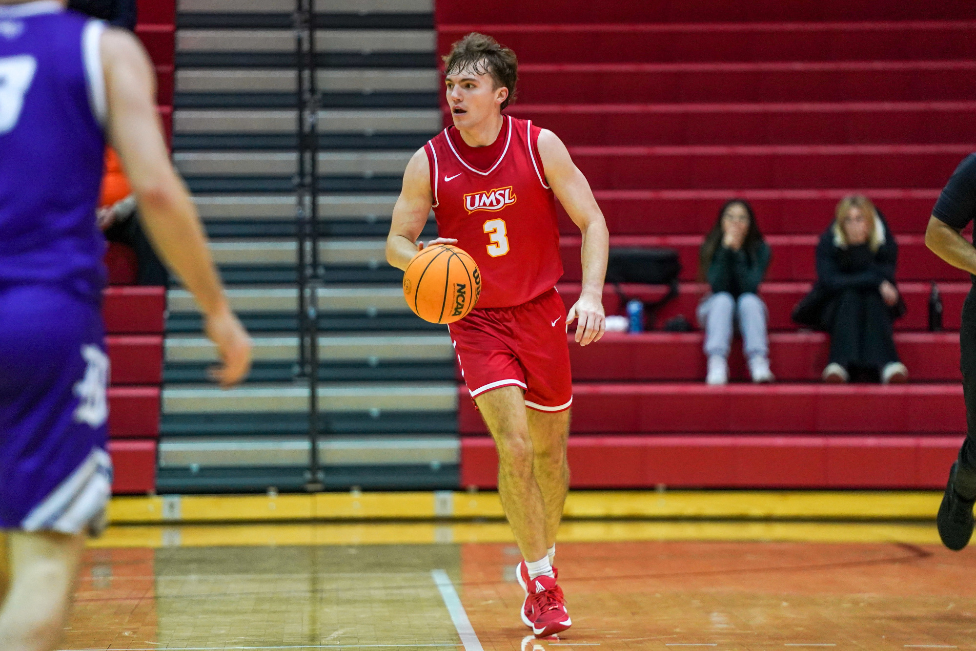 Jake Hamilton dribbles the ball up floor against Kentucky Wesleyan