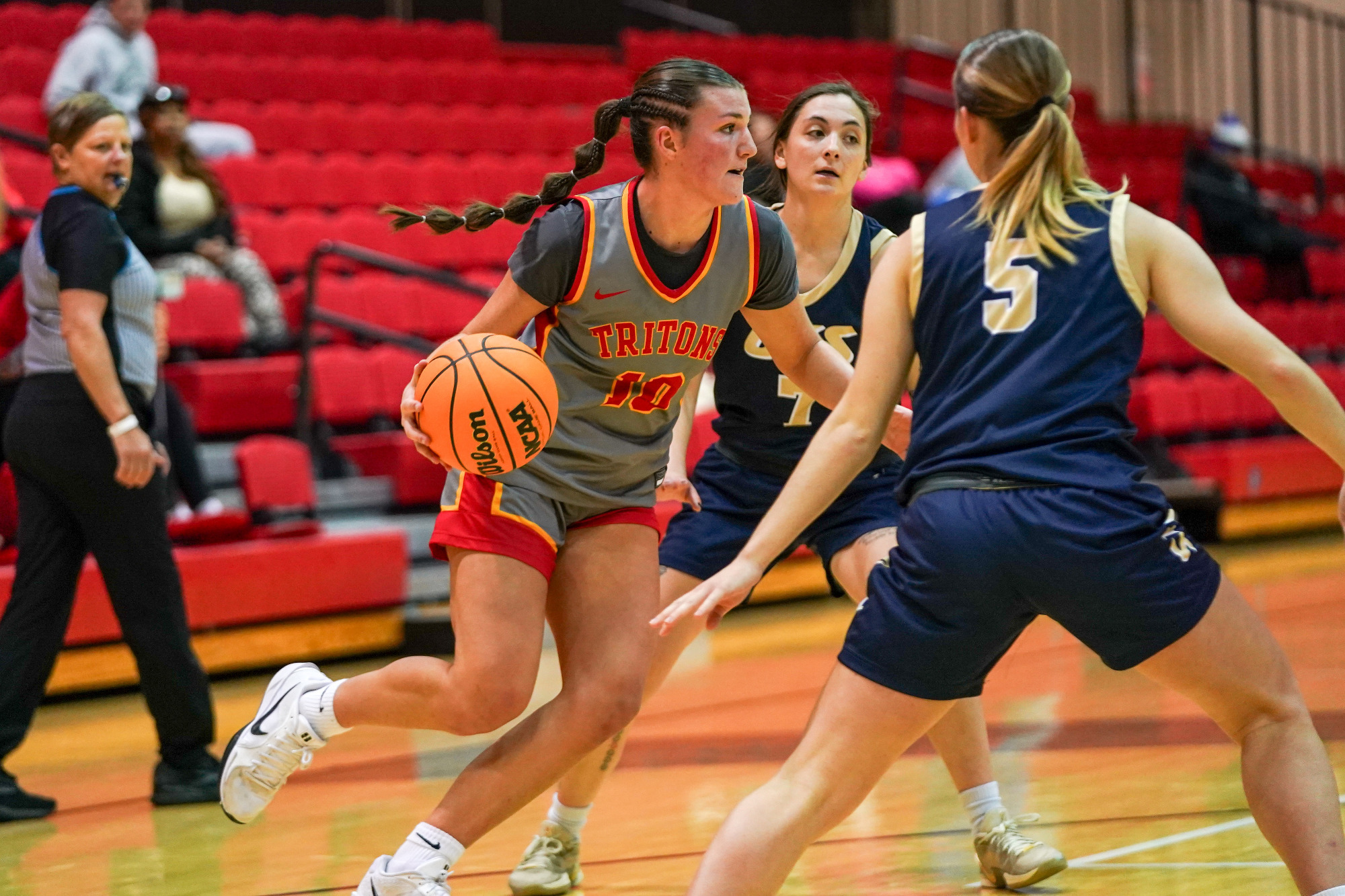 Jayden Kuper drives through the Illinois Springfield defense