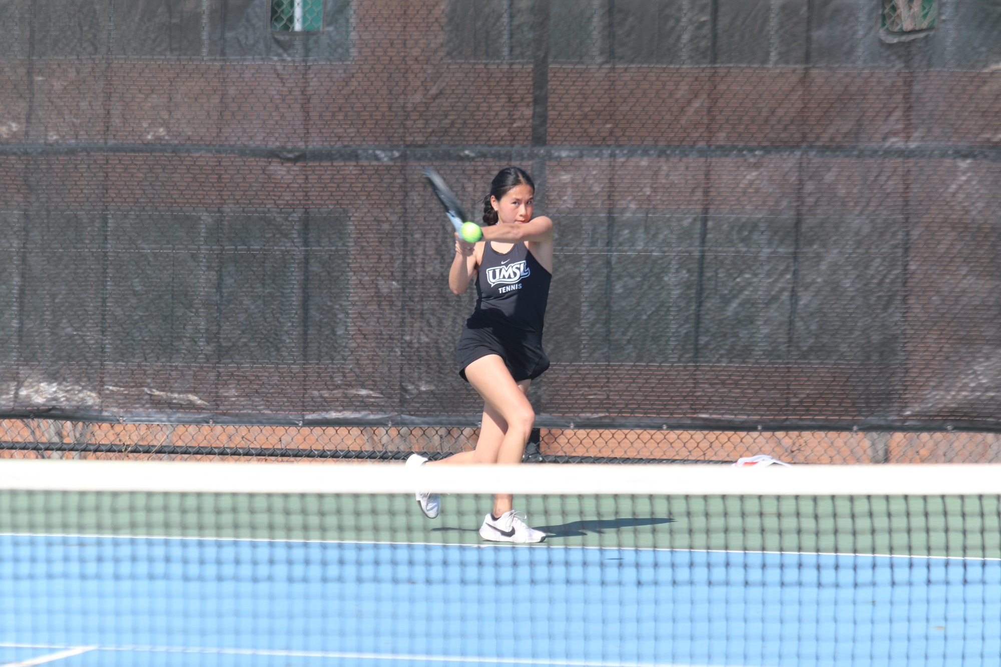 Hannah Tse hits a backhand shot