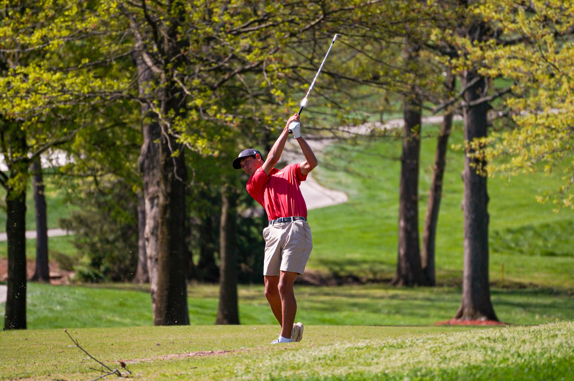 Trigg Lindahl hits an approach shot from the fairway