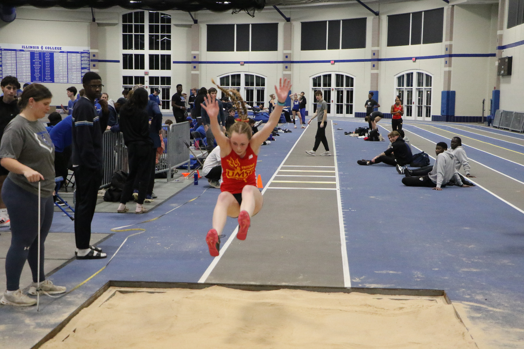 Melissa White competing in the triple jump