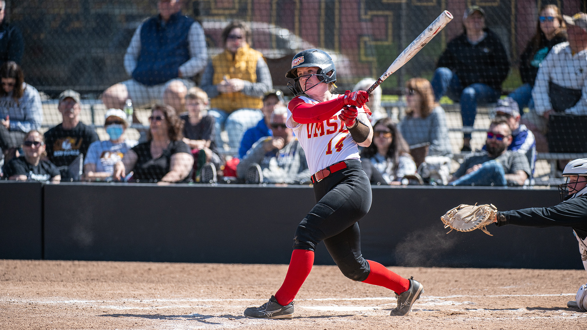 Jamie Widule follows through on a swing