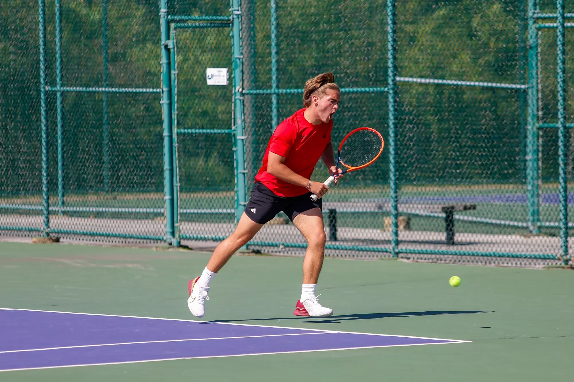Joan Garros celebrates after winning a point