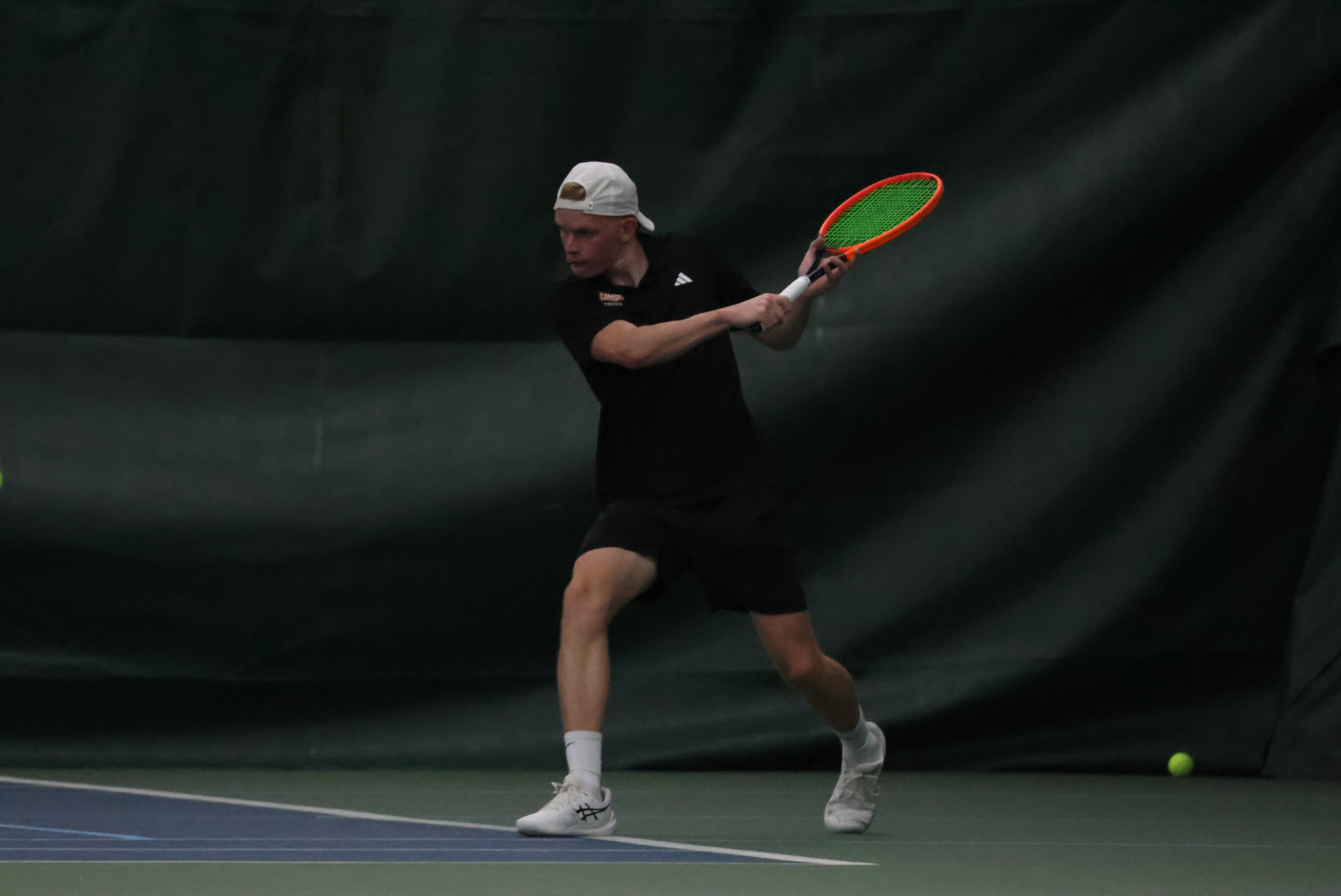 Percy Siercke returns a shot