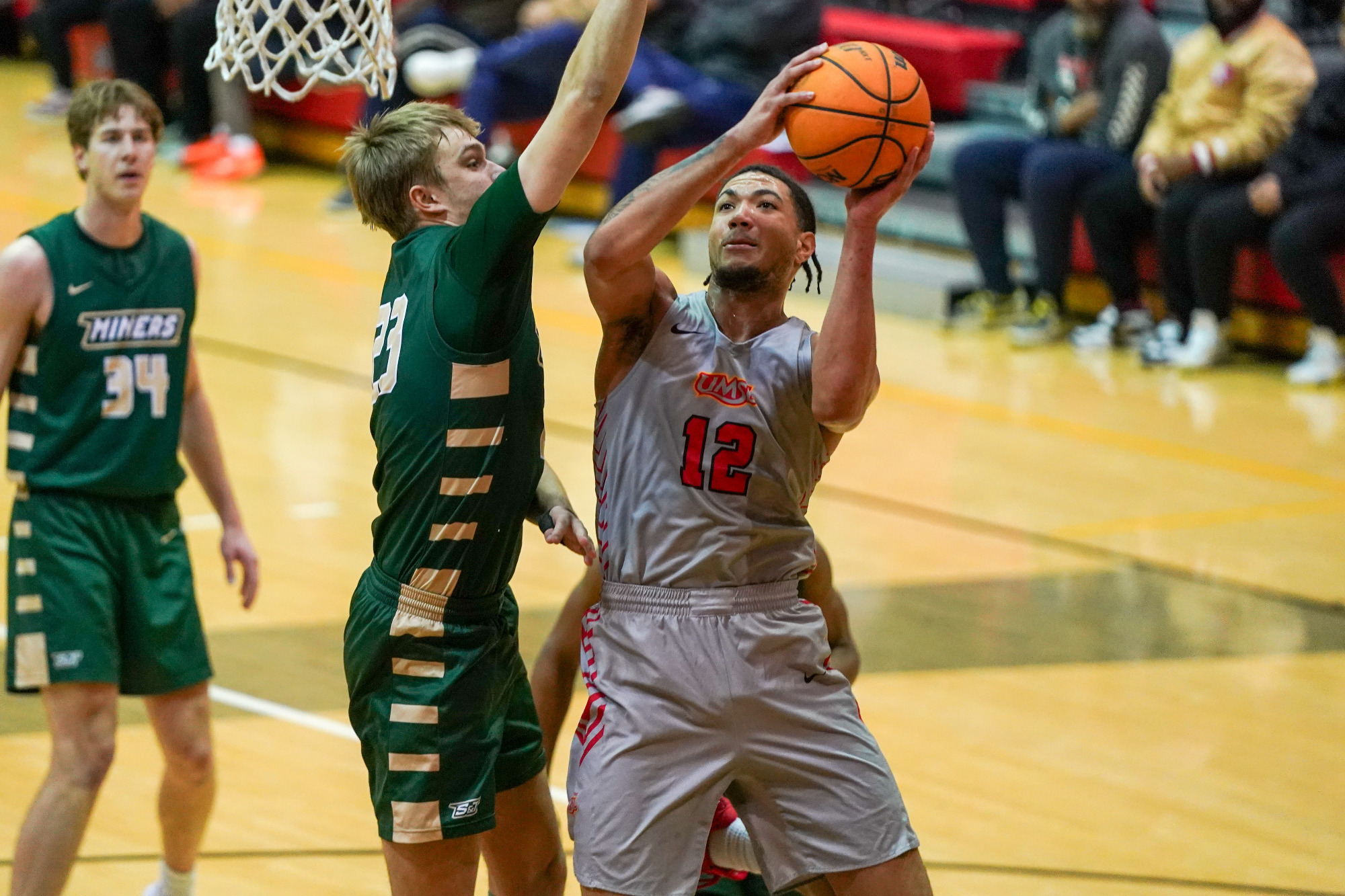 Vincent Davis III goes up for layup against a Missouri S&T defender in a game on January 15, 2026.