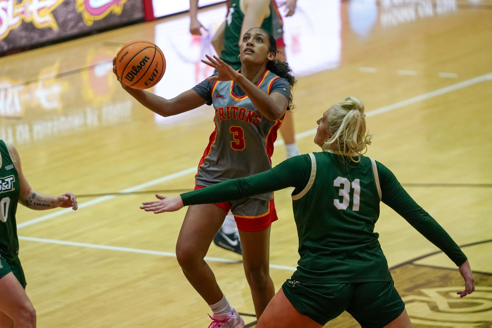 Jaeda Wilson goes up for a layup against a Missouri S&T defender in a game on January 15, 2026.