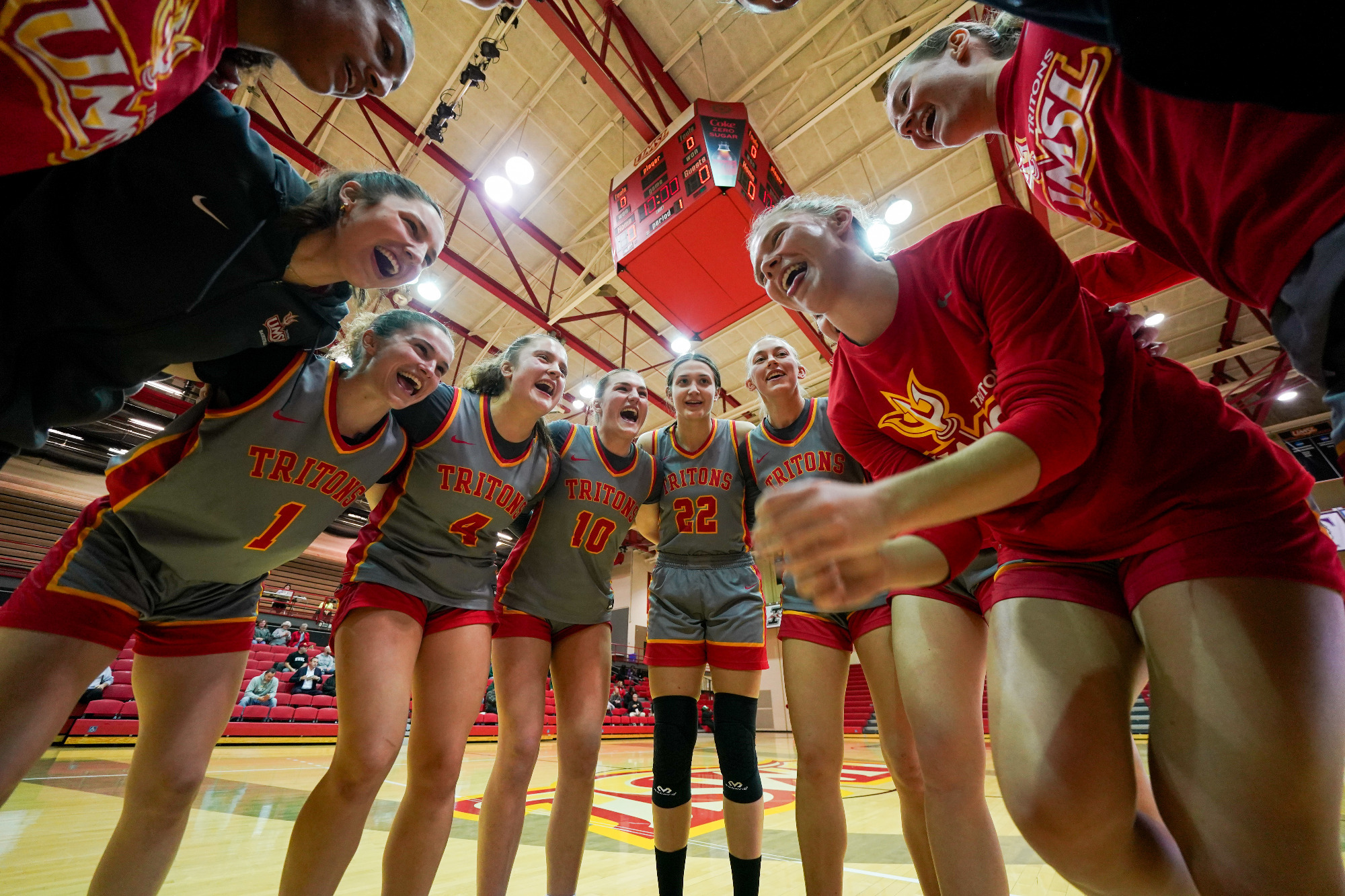 UMSL women's basketball players huddle before their game against Missouri S&T