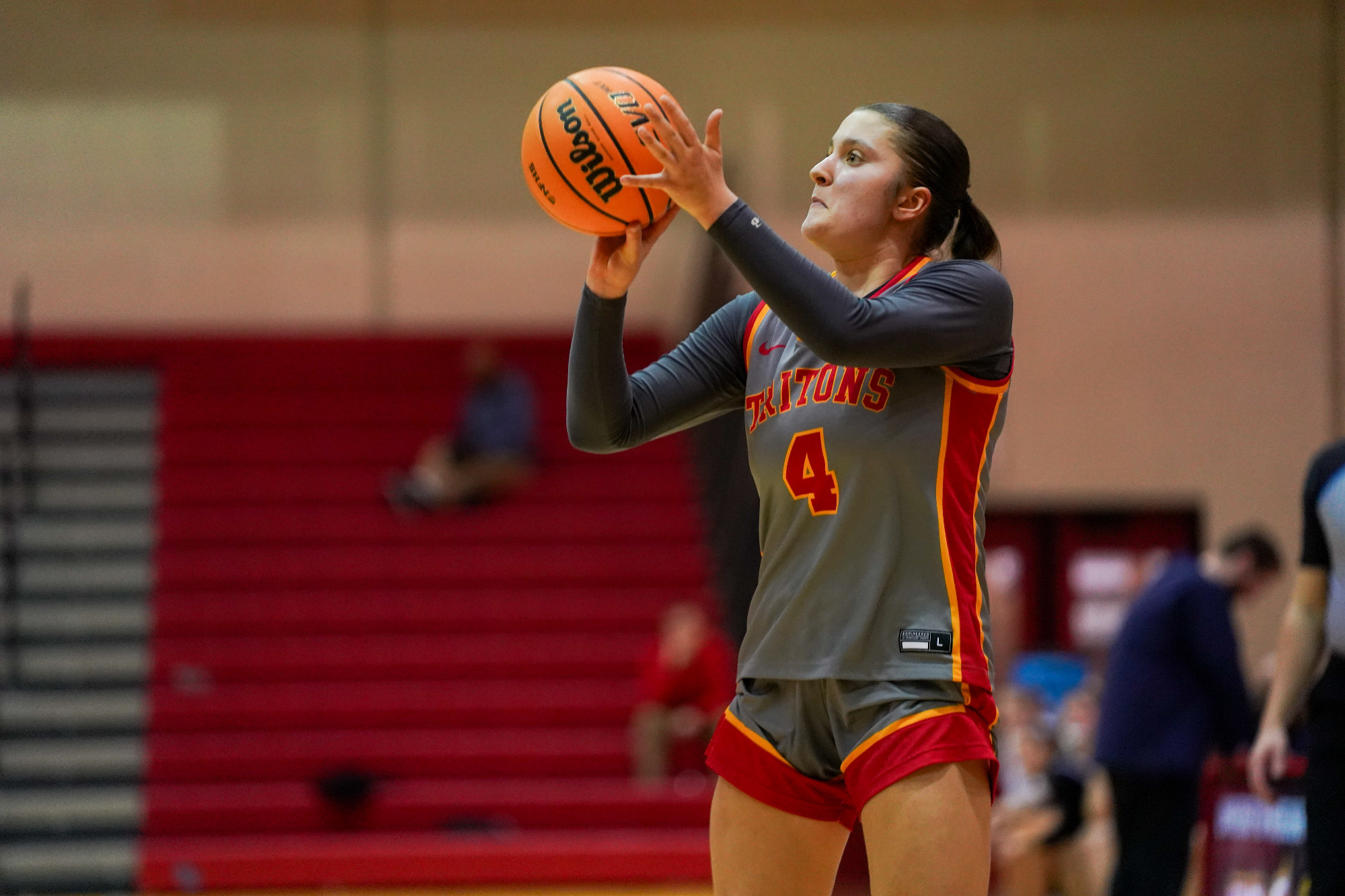 Lexi Hanna attempts a three-point shot in a game against Upper Iowa