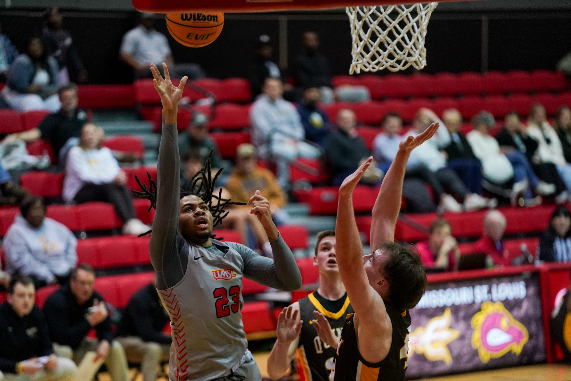 Demetris Phillips scores two of his game-high 19 points in a men's college basketball game against Quincy on Jan. 2, 2026