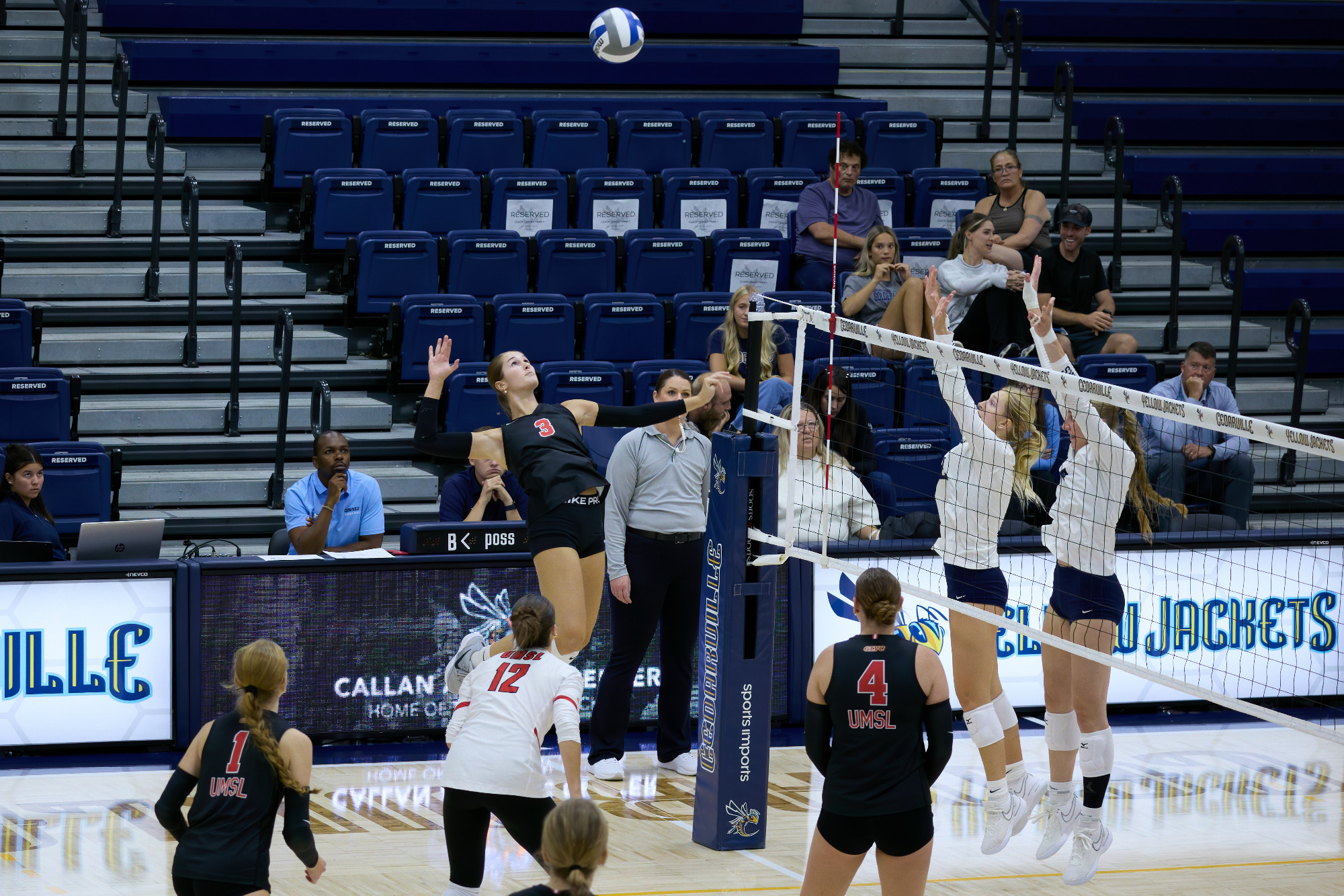 Addison Voorhees goes up for an attack attempt in a match against Concordia-St. Paul