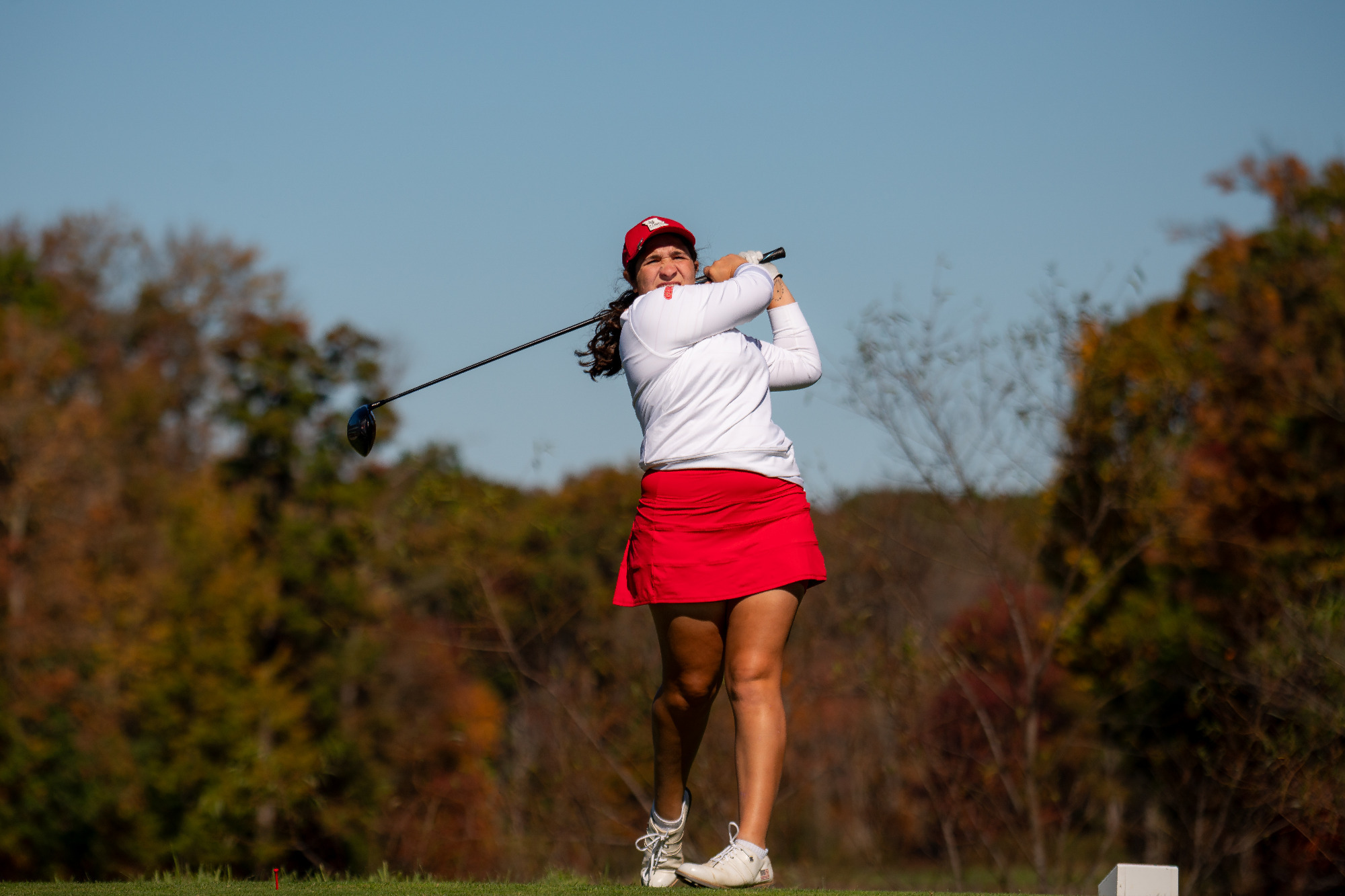 Mayan Covarrubias follows her tee shot at the Intercollegiate at Nemacolin