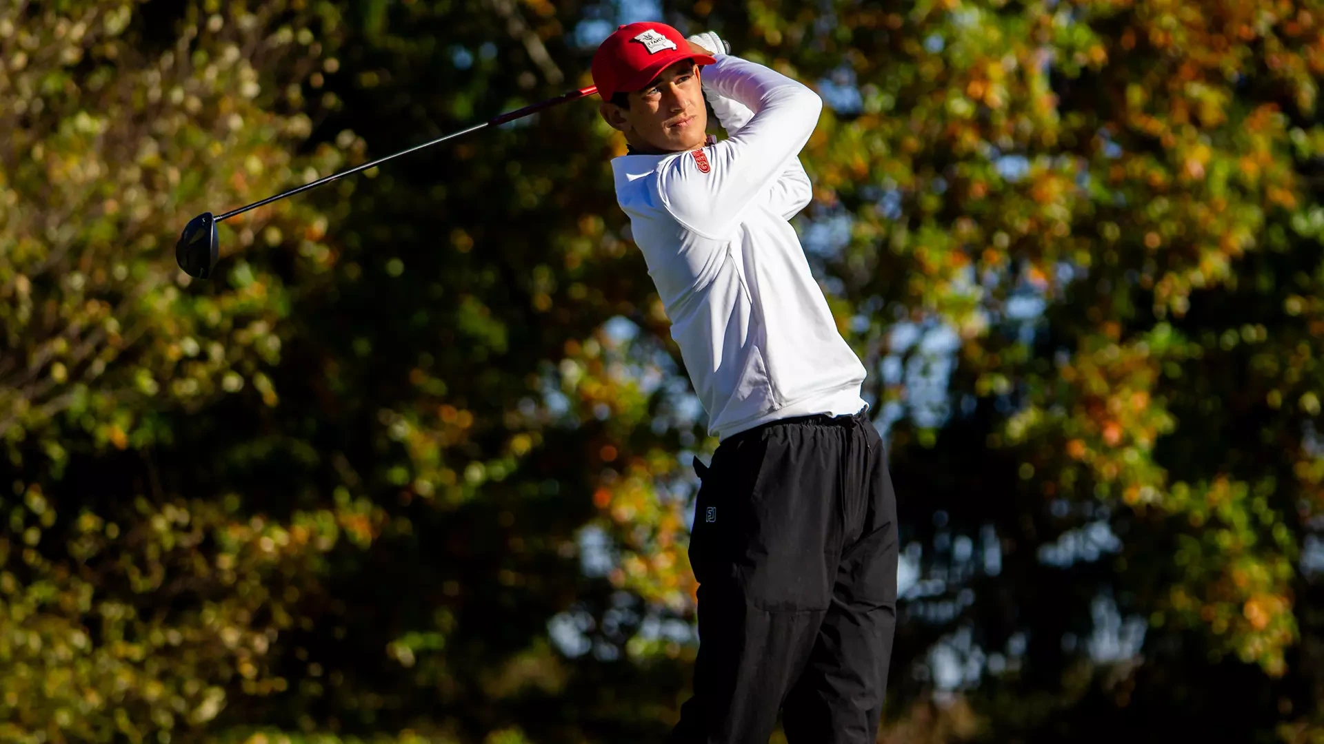 Trigg Lindahl follows his drive after teeing off at the Intercollegiate at Nemacolin.