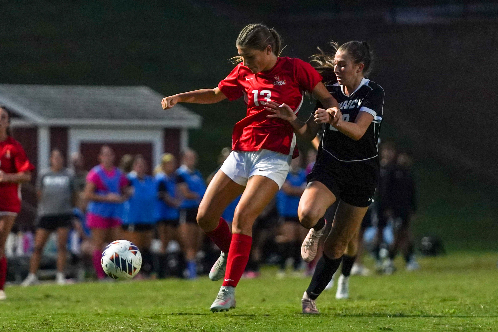 Ella Anselm battles with a Quincy defender for possession of the soccer ball in an NCAA Division II women's soccer contest on September 30 at Don Dallas Field
