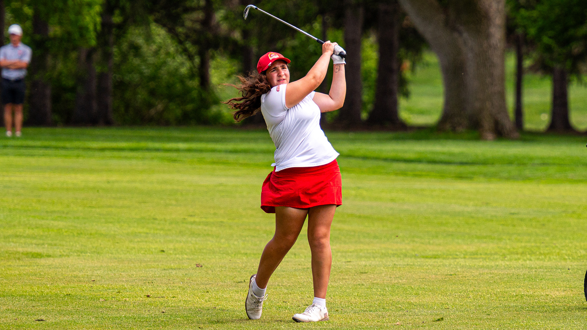 Mayan Covarrubias hits an approach shot from the fairway at Findlay Country Club