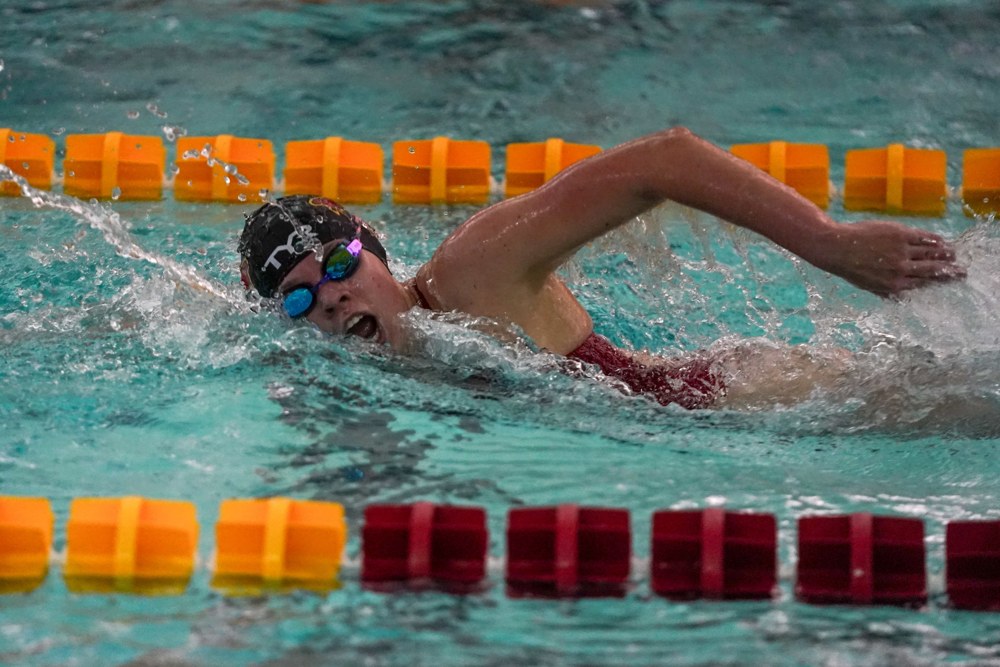 Justice Beard swimming the freestyle stroke in a dual meet against Saint Louis University on January 23, 2026