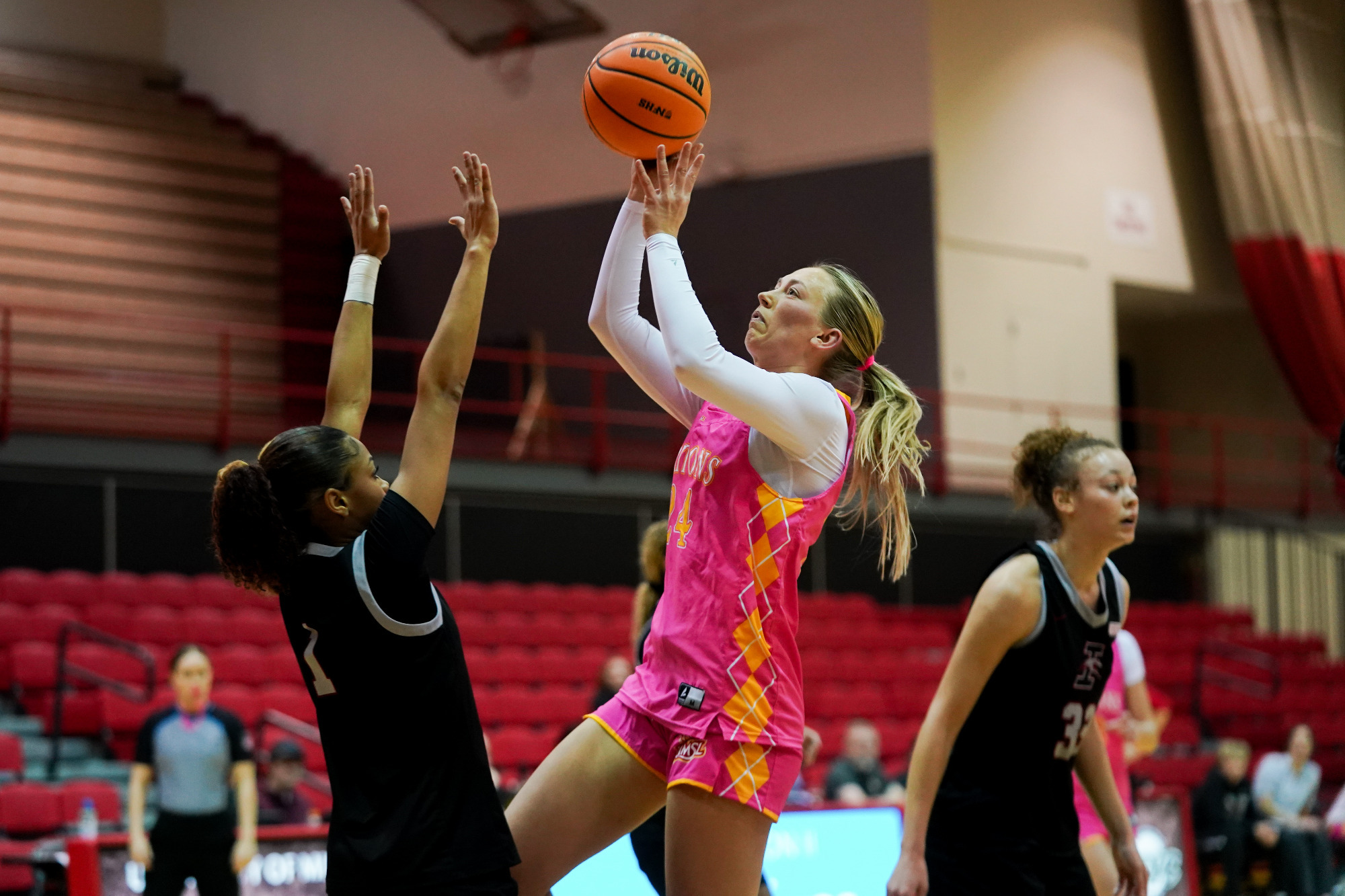 Morgan Ramthun attempts a layup over a UIndy defender in game on February 5, 2026.