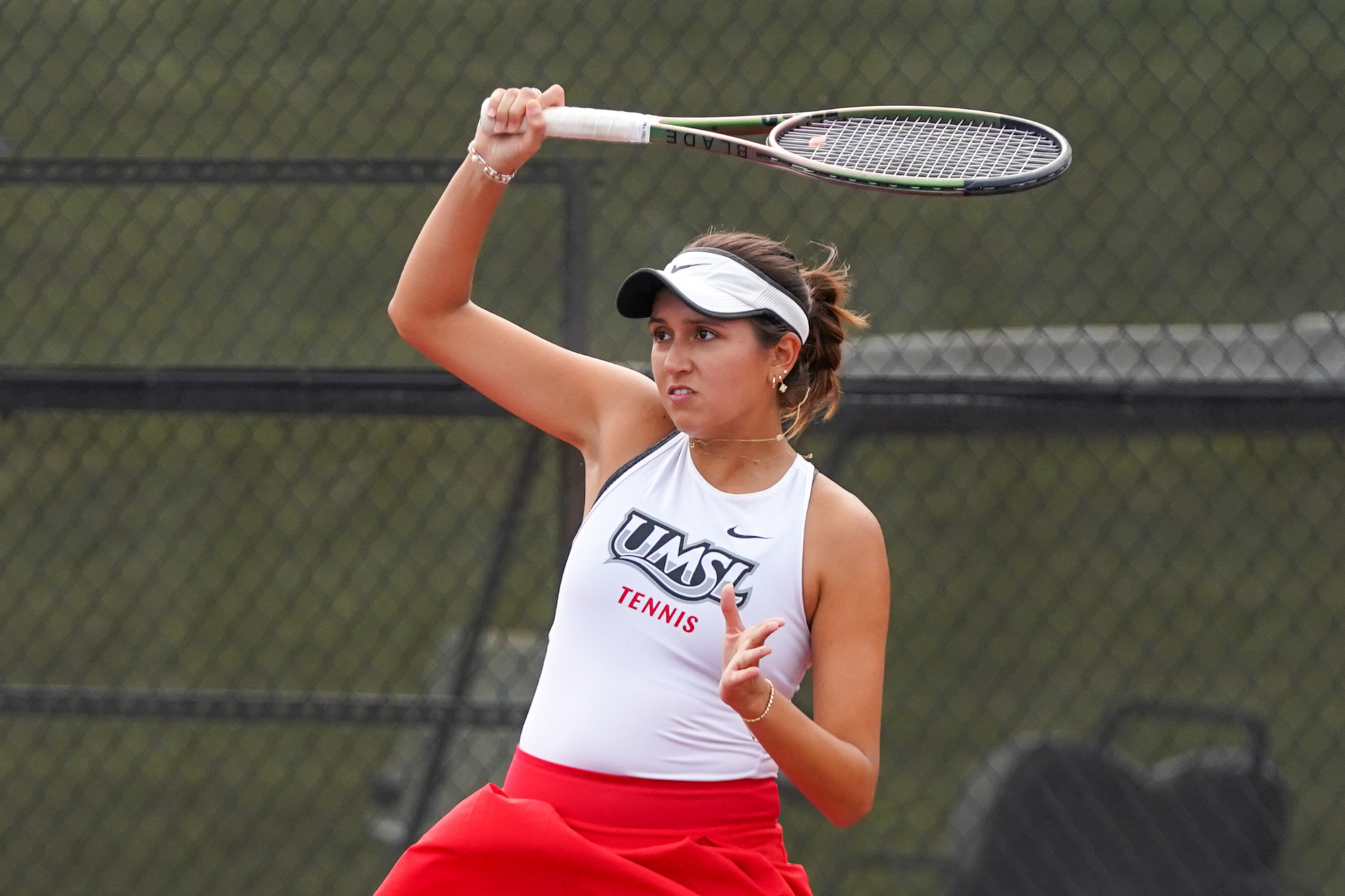 UMSL women's tennis player Aleksandra Lopez returns an opponents shot in a match at the SIU Edwardsville Cougar Invite