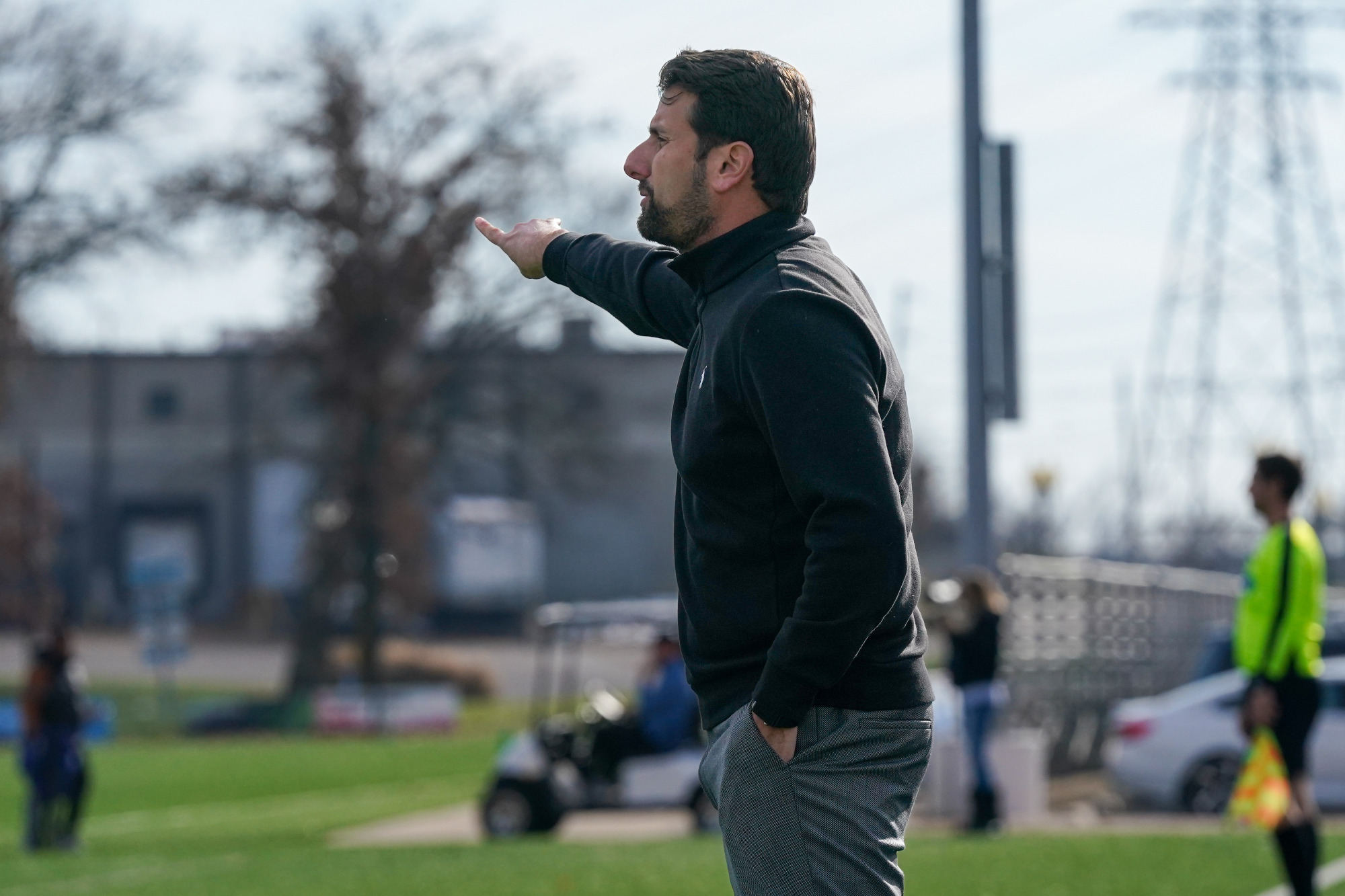 Stephen Cavallo coaching from the sideline during the NCAA Quarterfinal contest against Washburn