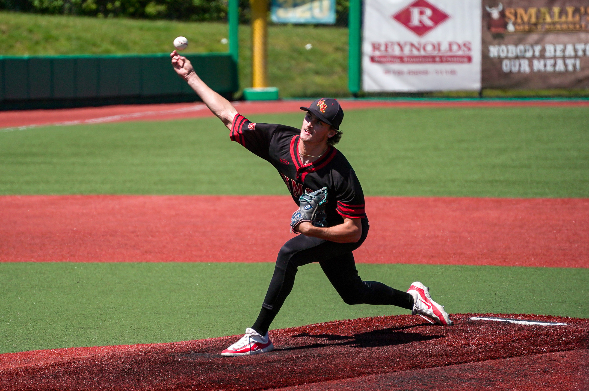 Bryce Stenzel delivers a pitch to the plate.