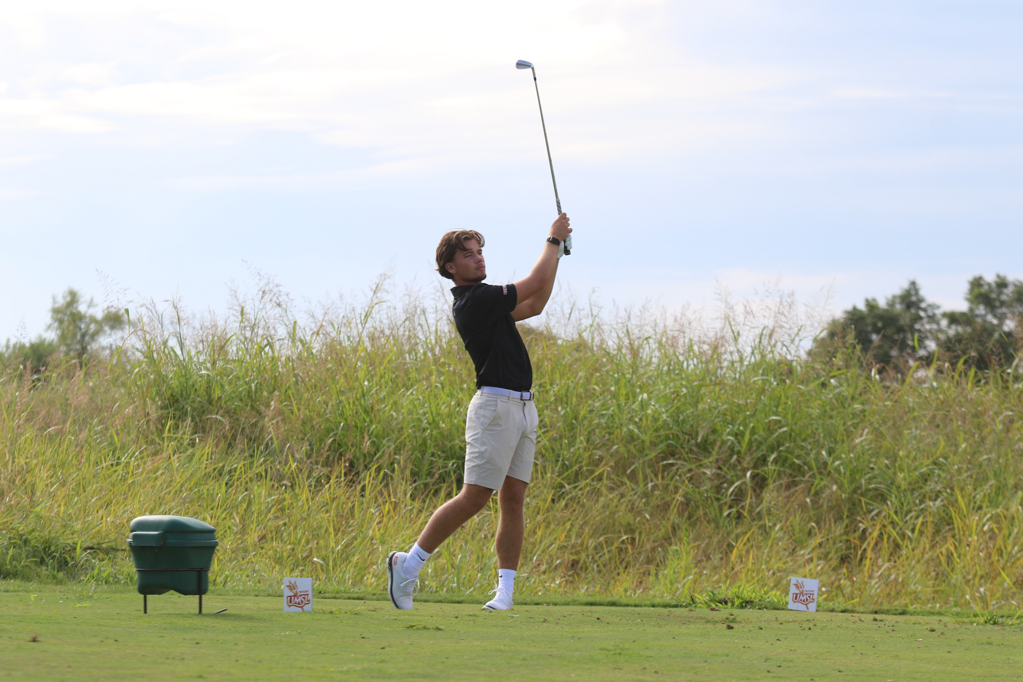 Ludvig Granlund watches to see where his drive lands after teeing off on a hole at the Arch Cup.