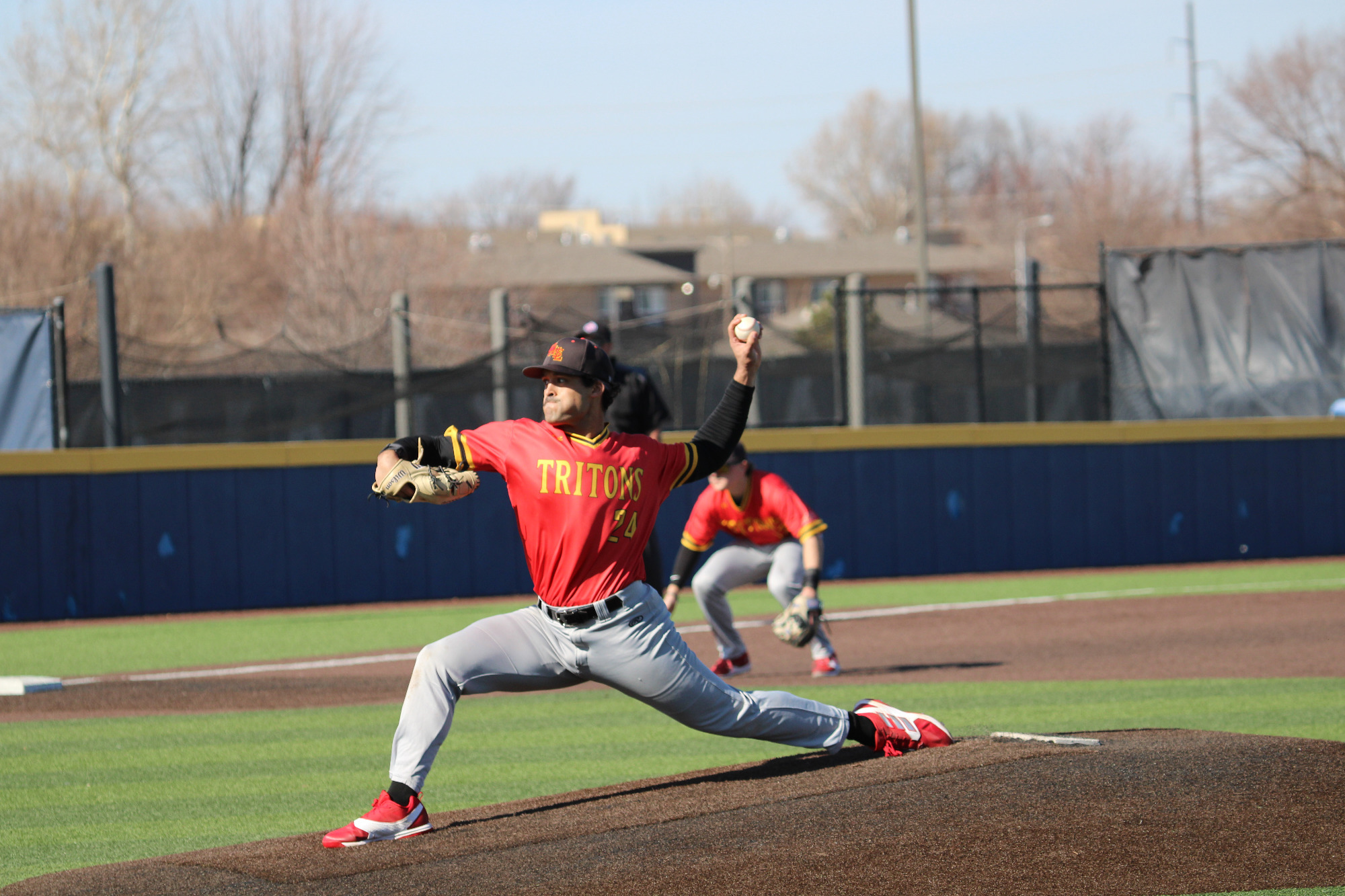 Eli Cartwright delivers a pitch to home plate