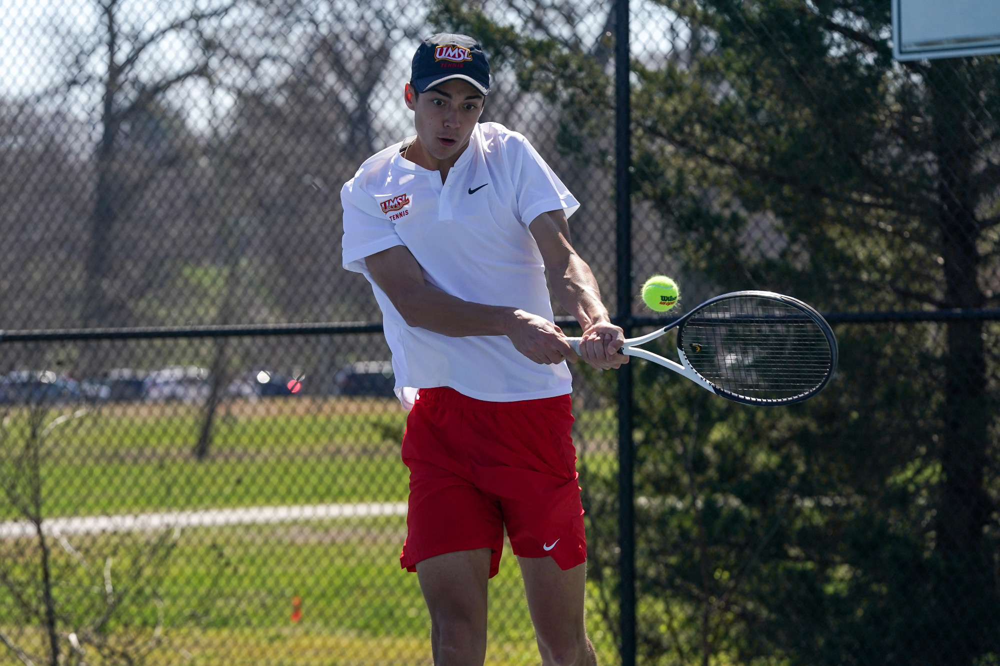 Henry Roberts returns a shot in a match against Northwest Missouri State